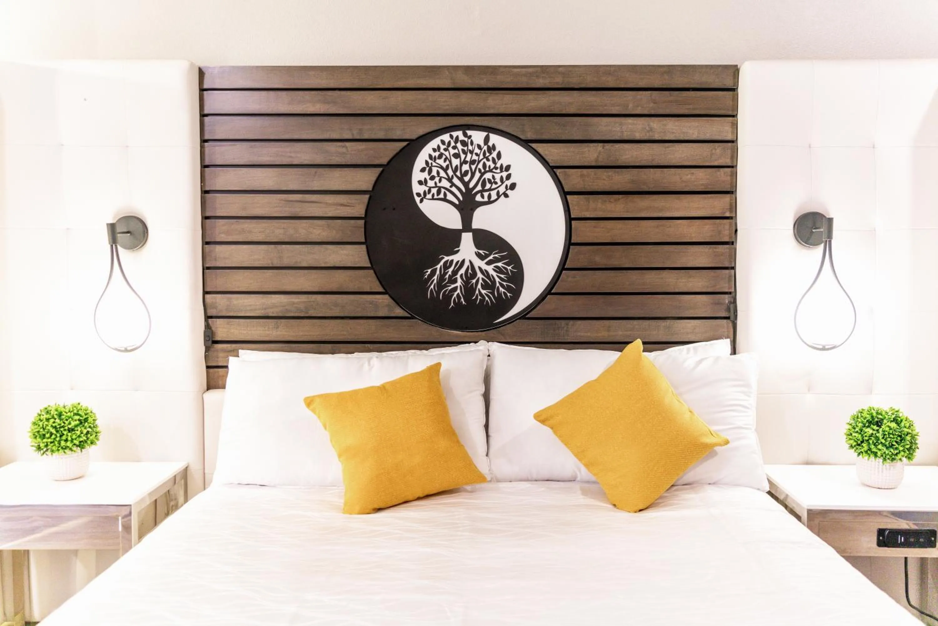 Bed in Aspire Inn Studios & Spas