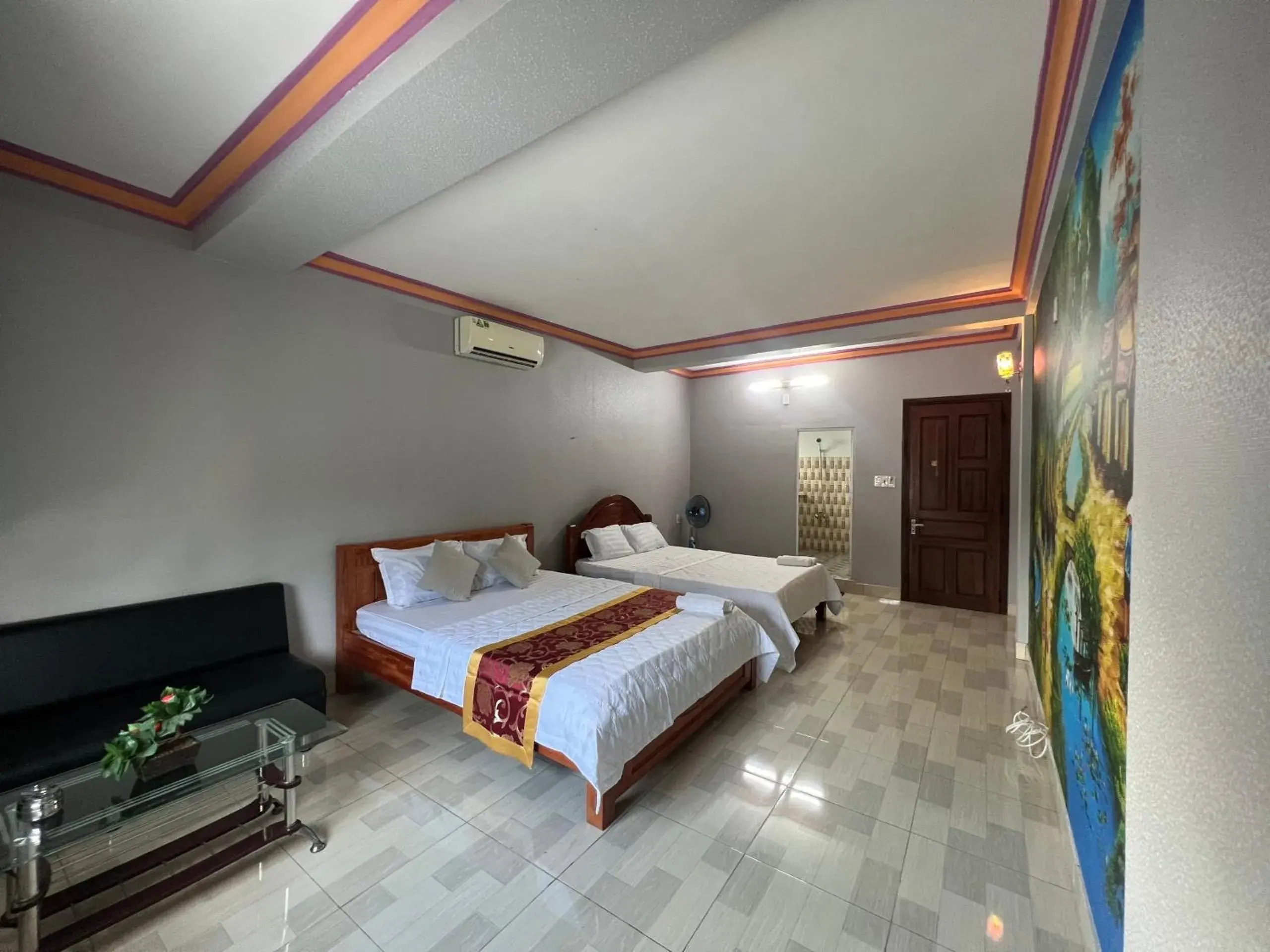 Deluxe Queen Room with Two Queen Beds in Nhà Nghỉ Hồng Trang - Thủ Dầu Một Deluxe Queen Room with Two Queen Beds in Nhà Nghỉ Hồng Trang - Thủ Dầu Một