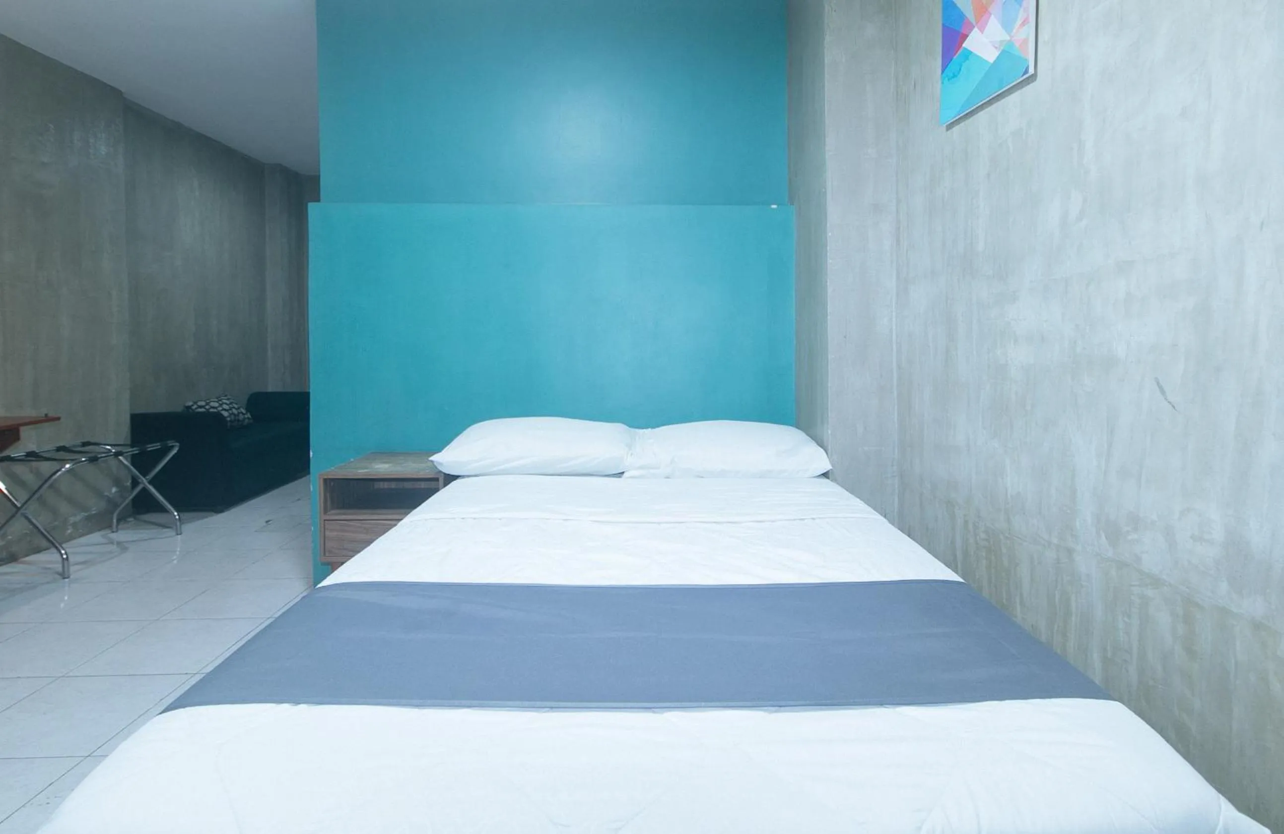 Bed in Rcee Place by RedDoorz