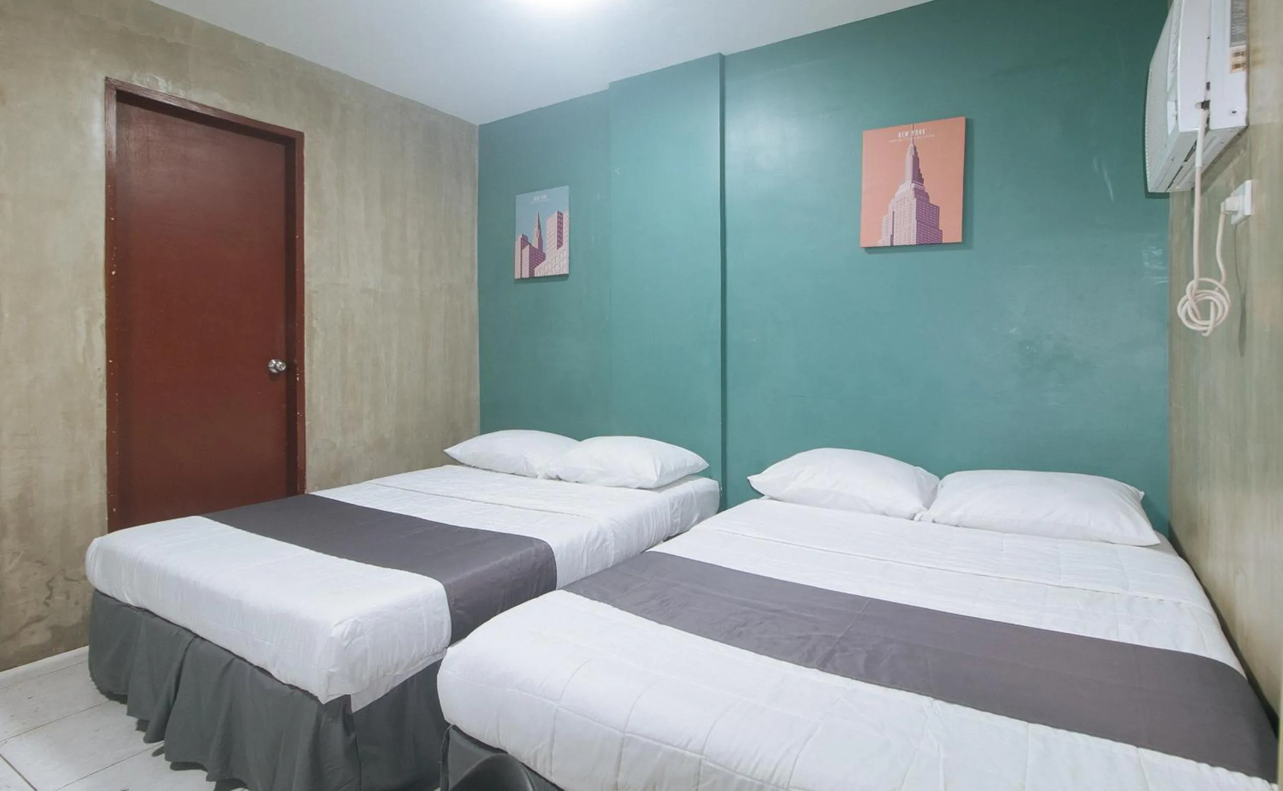 Bed in Rcee Place by RedDoorz