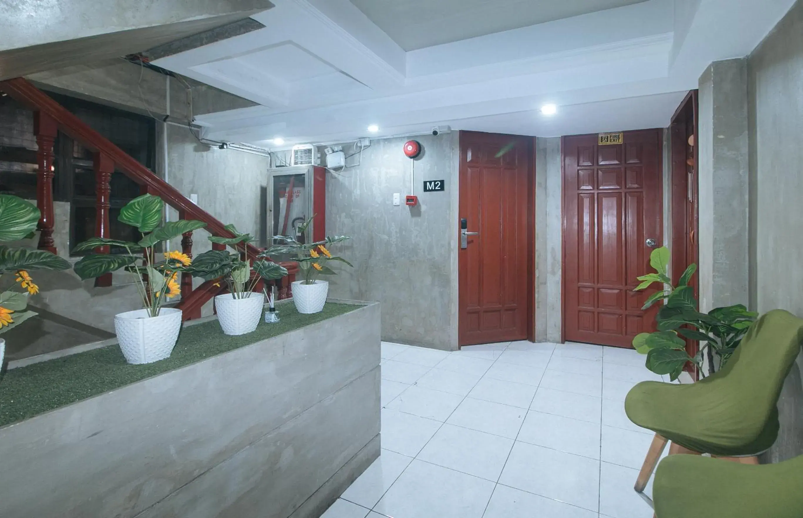 Seating area in Rcee Place by RedDoorz Seating area in Rcee Place by RedDoorz