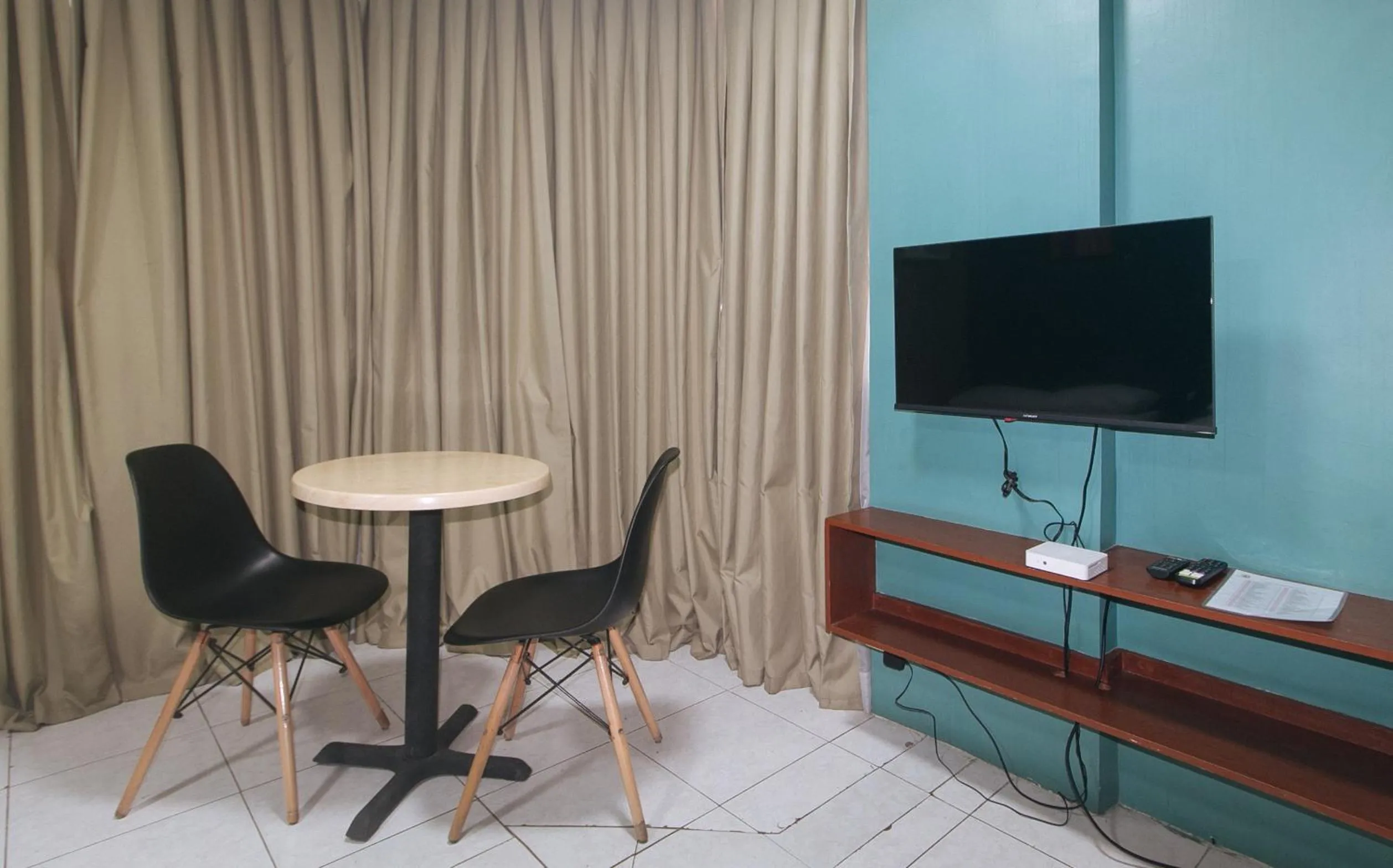 TV and multimedia in Rcee Place by RedDoorz