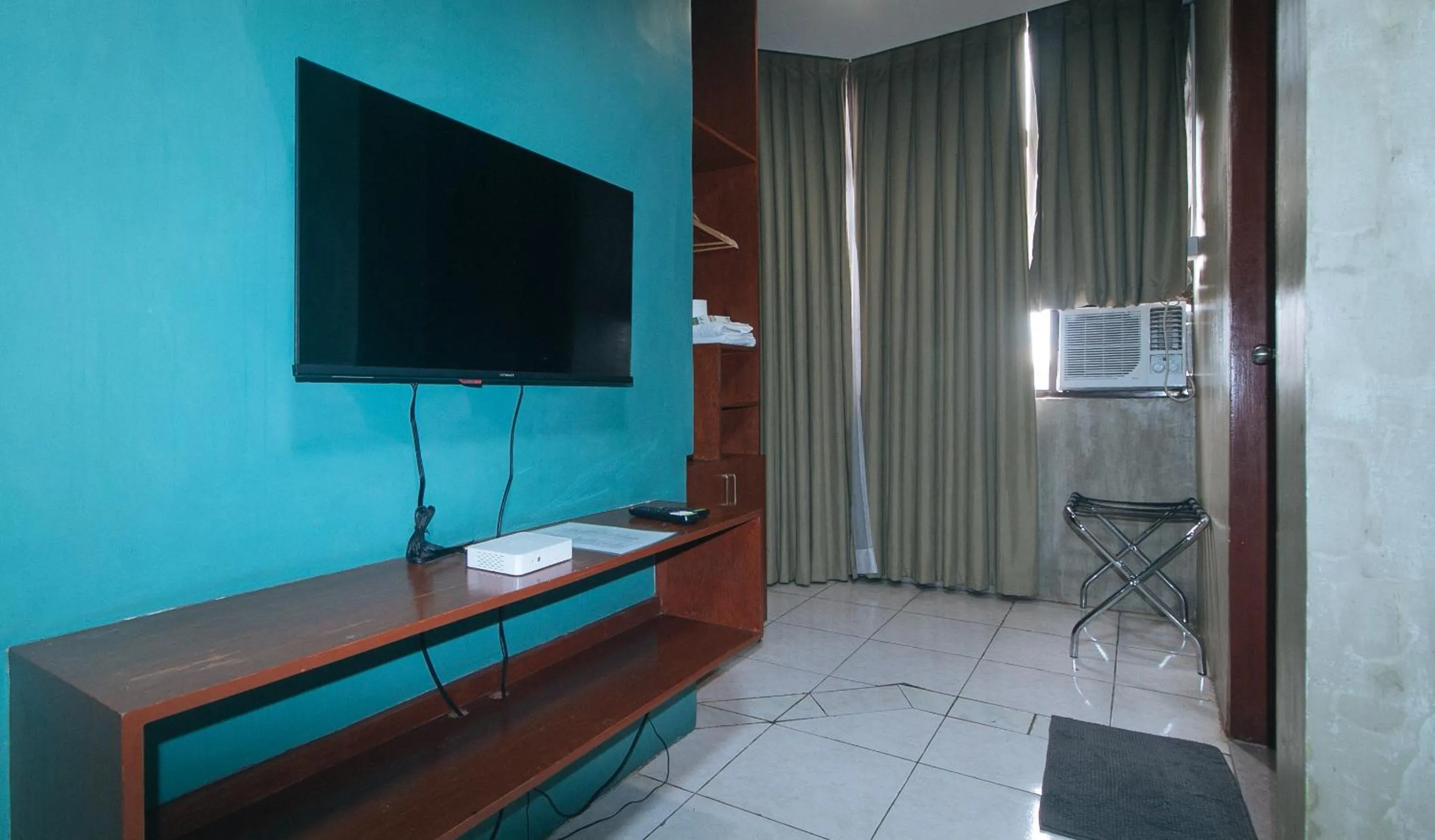 TV and multimedia in Rcee Place by RedDoorz