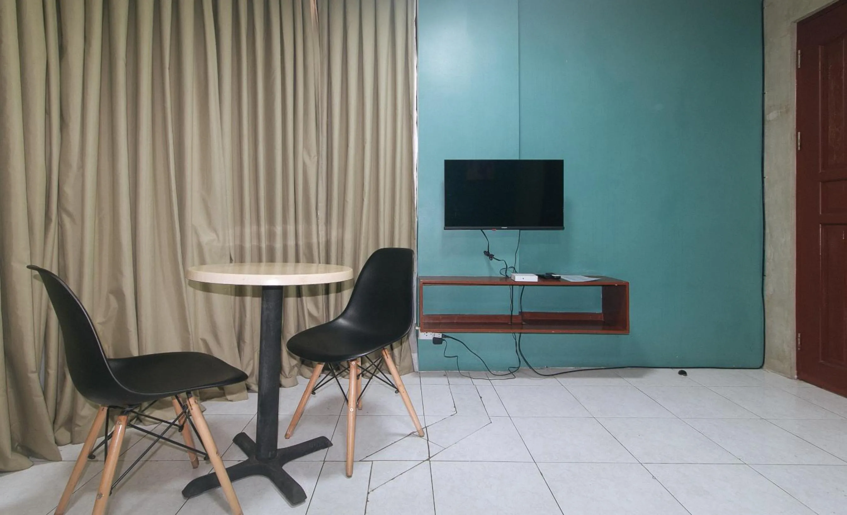 TV and multimedia in Rcee Place by RedDoorz