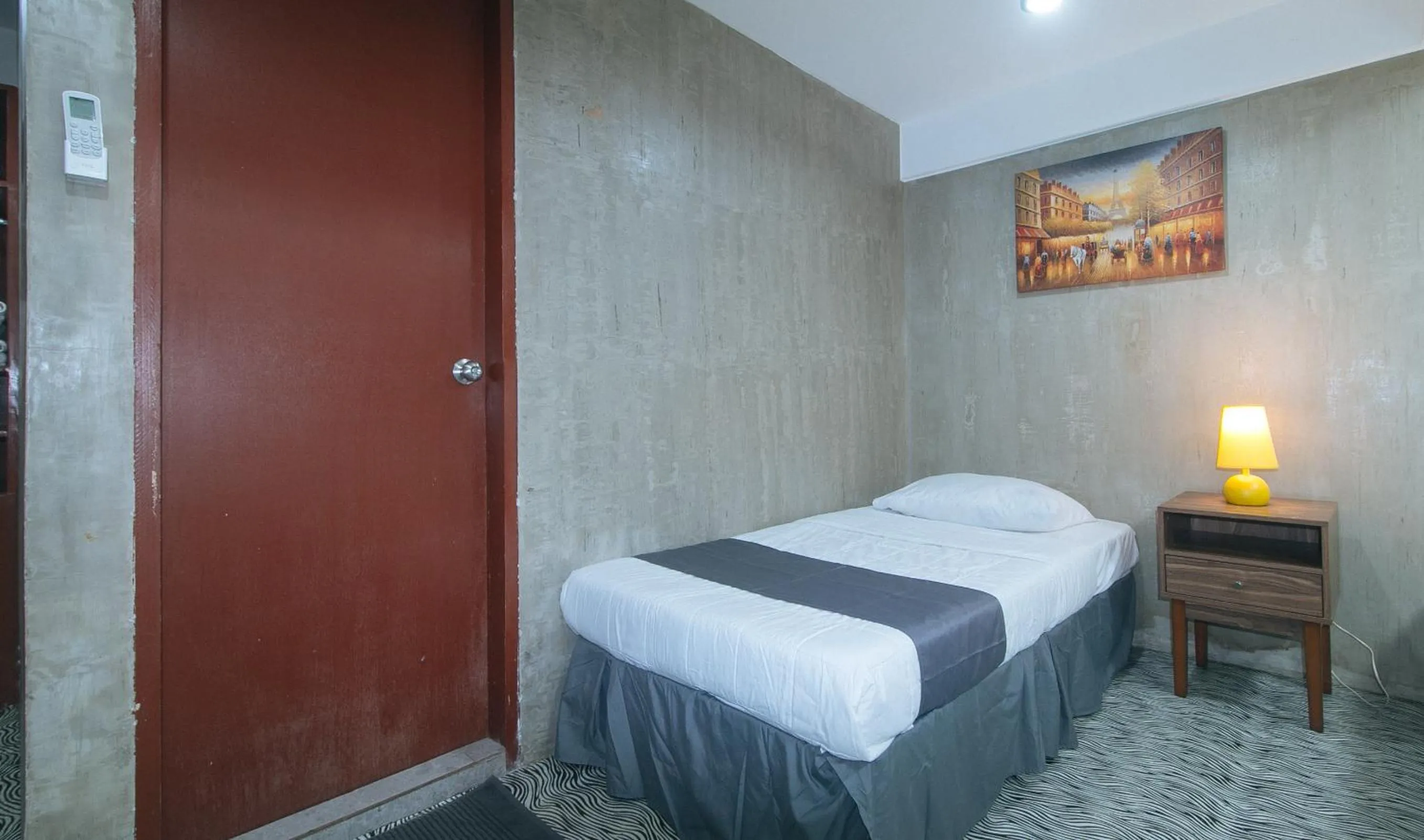 Bed in Rcee Place by RedDoorz