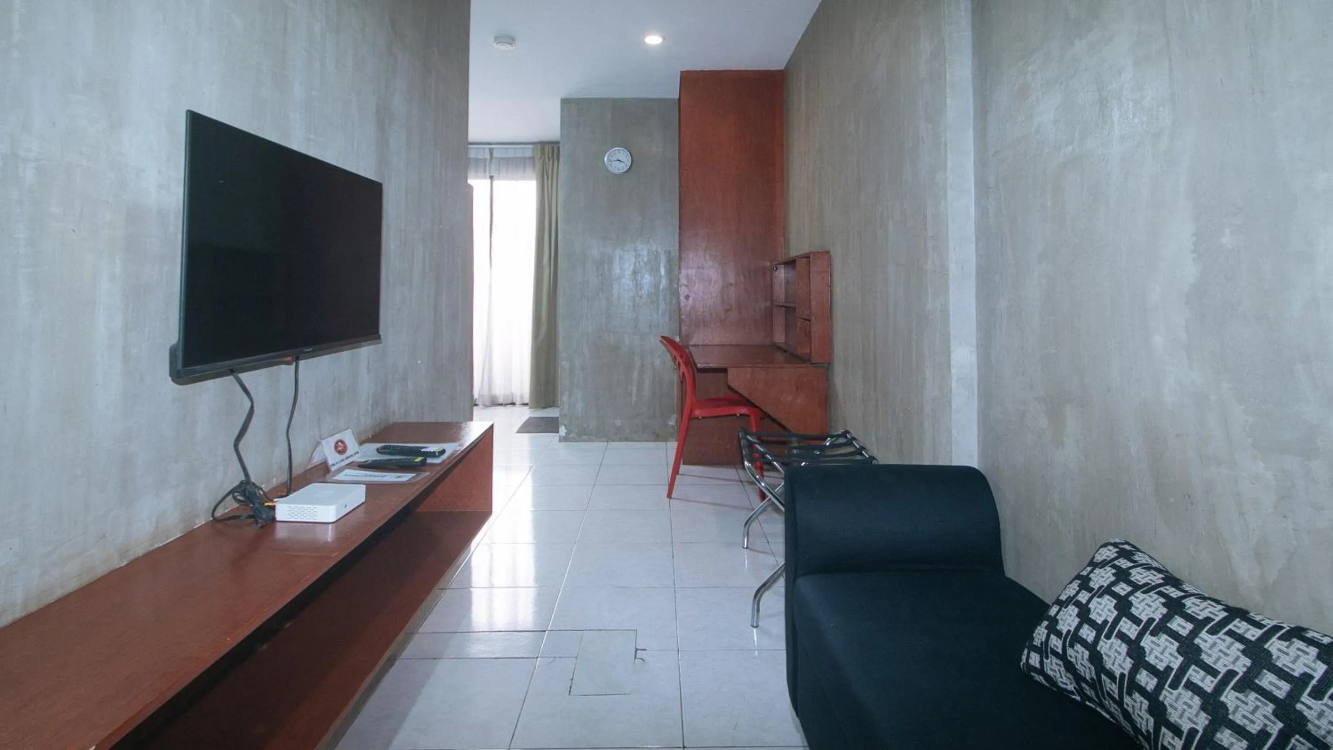 TV and multimedia in Rcee Place by RedDoorz