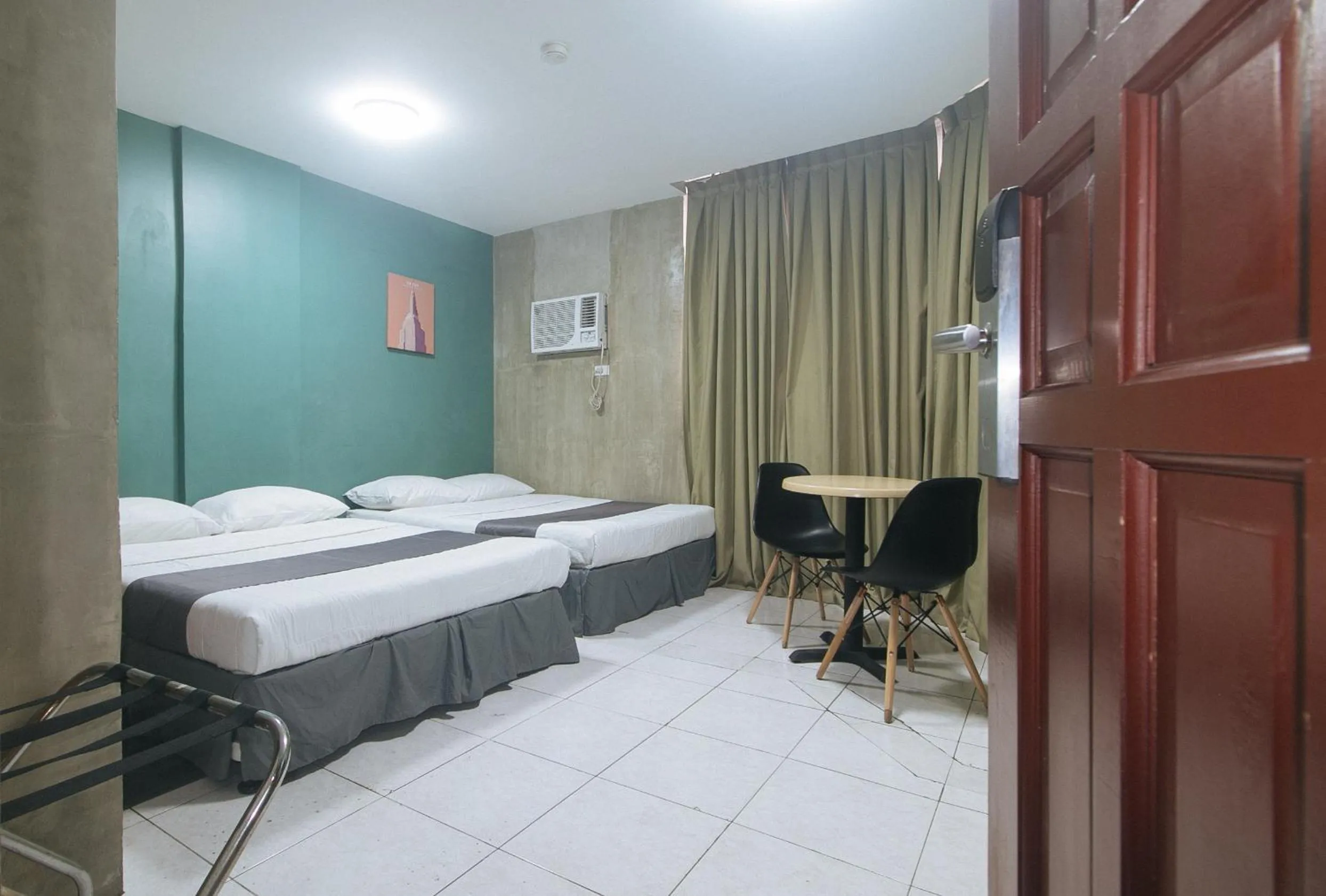 Bed in Rcee Place by RedDoorz