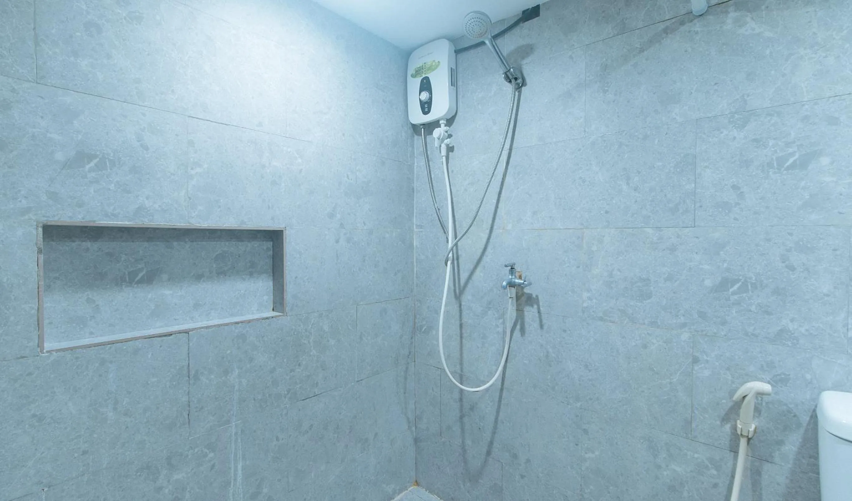 Shower in Rcee Place by RedDoorz