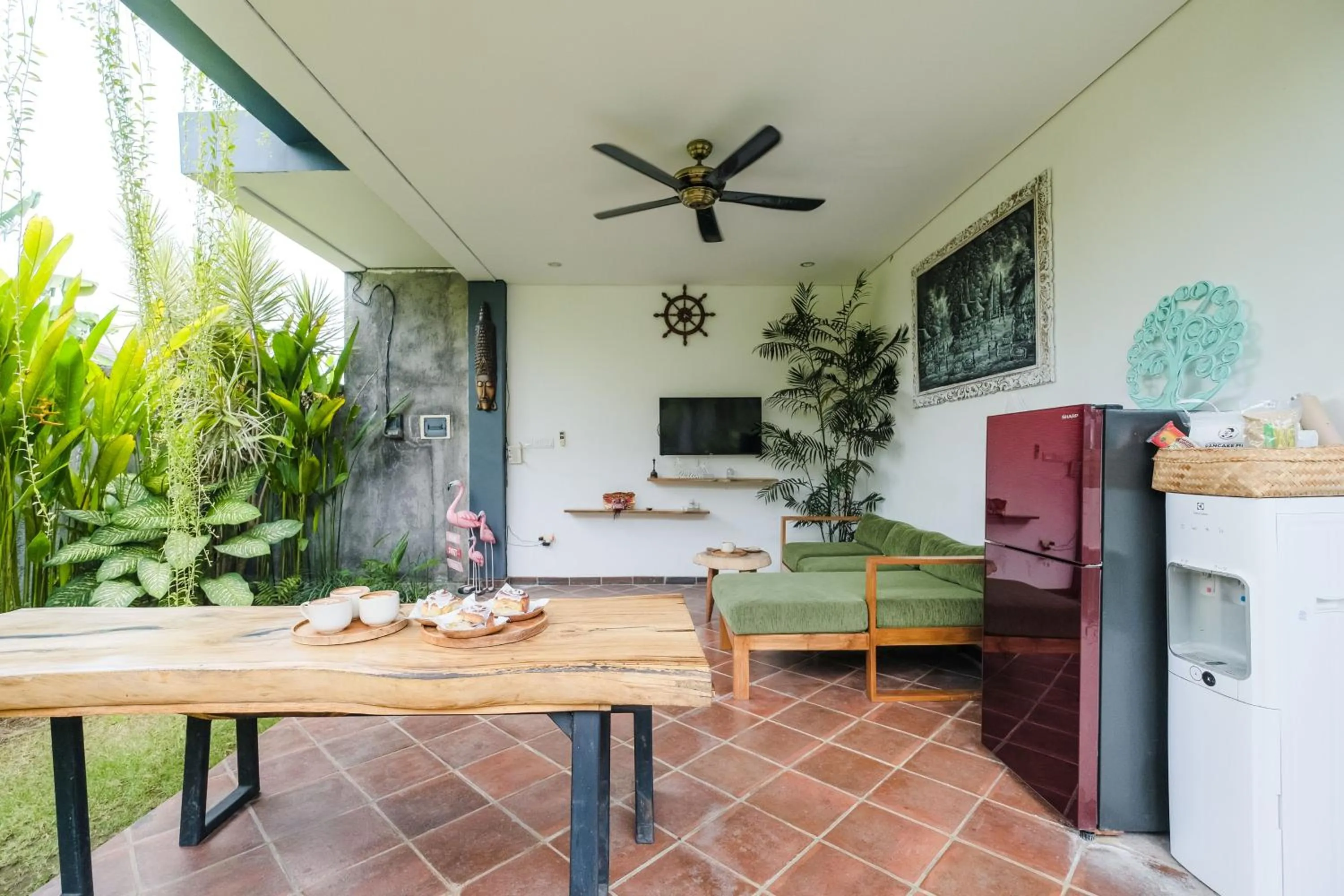 Communal lounge/ TV room in The Kumpi Bali by The Lavana