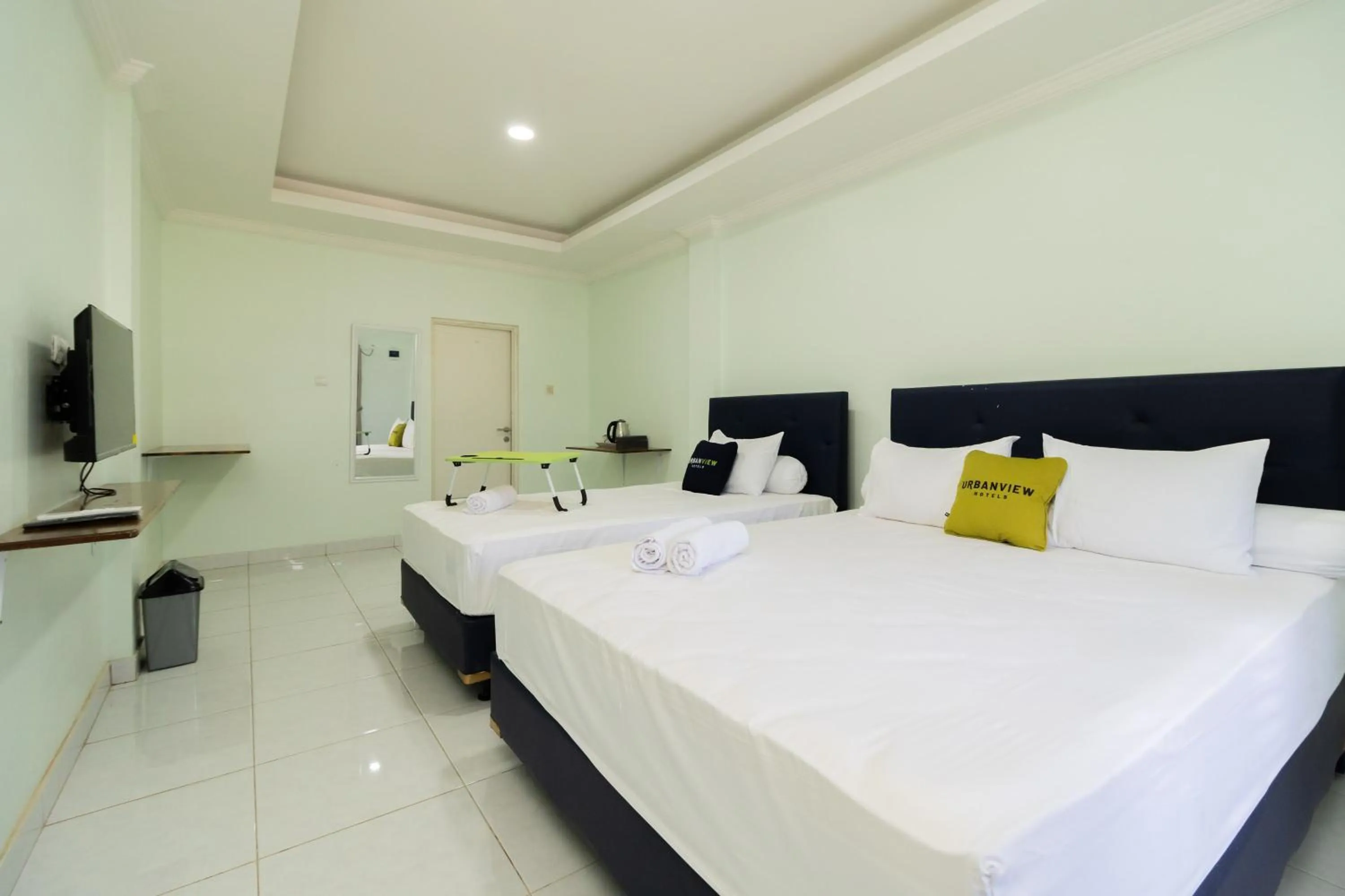 Bedroom, Bed in Urbanview Hotel Kampung Istal Megamendung Puncak by RedDoorz