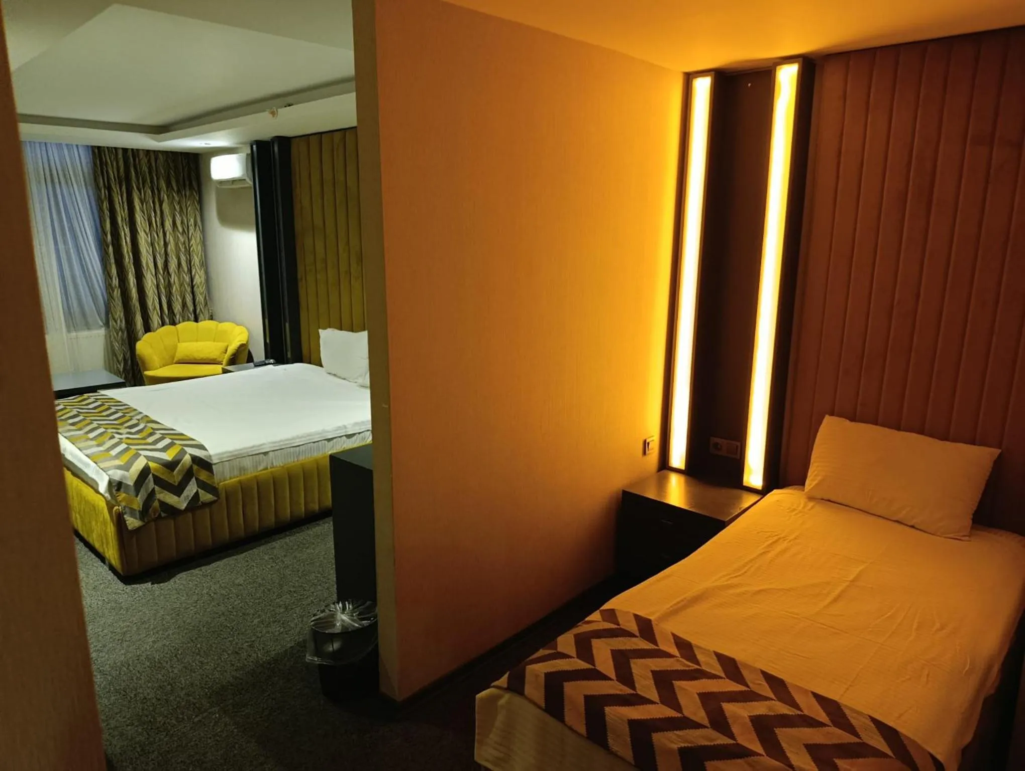 Bed in GRAND DORA HOTEL