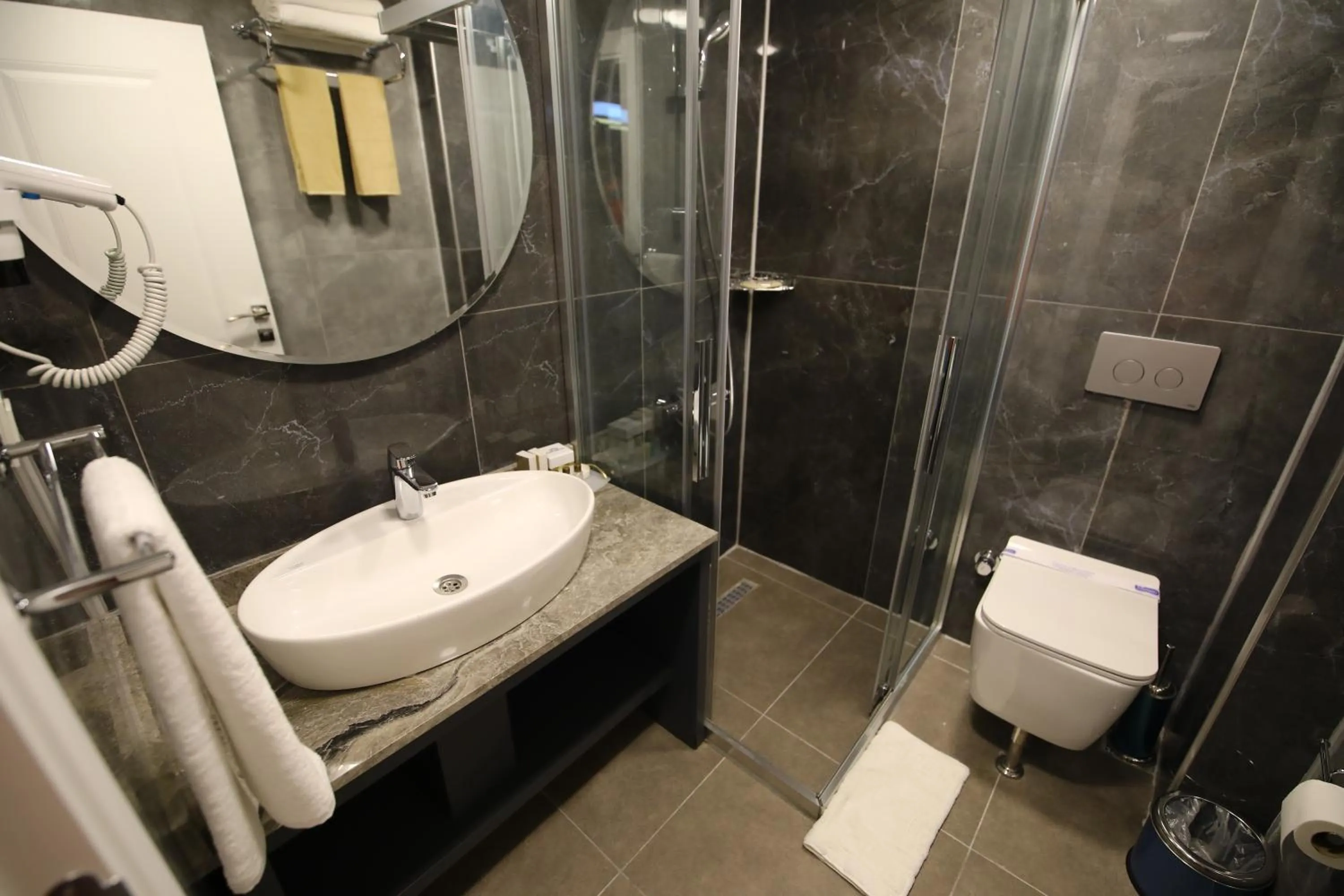 Bathroom in GRAND DORA HOTEL