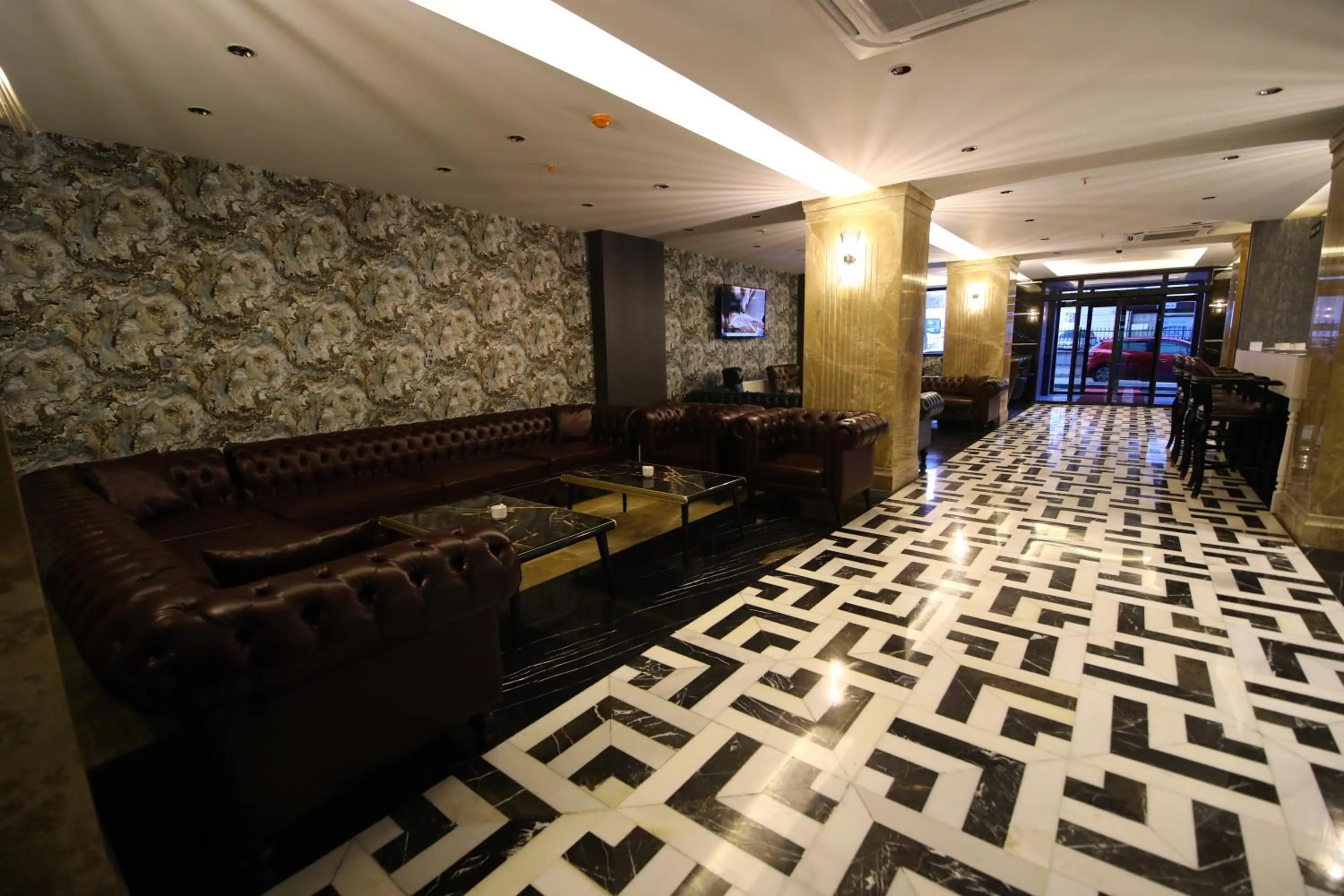 Lobby or reception in GRAND DORA HOTEL