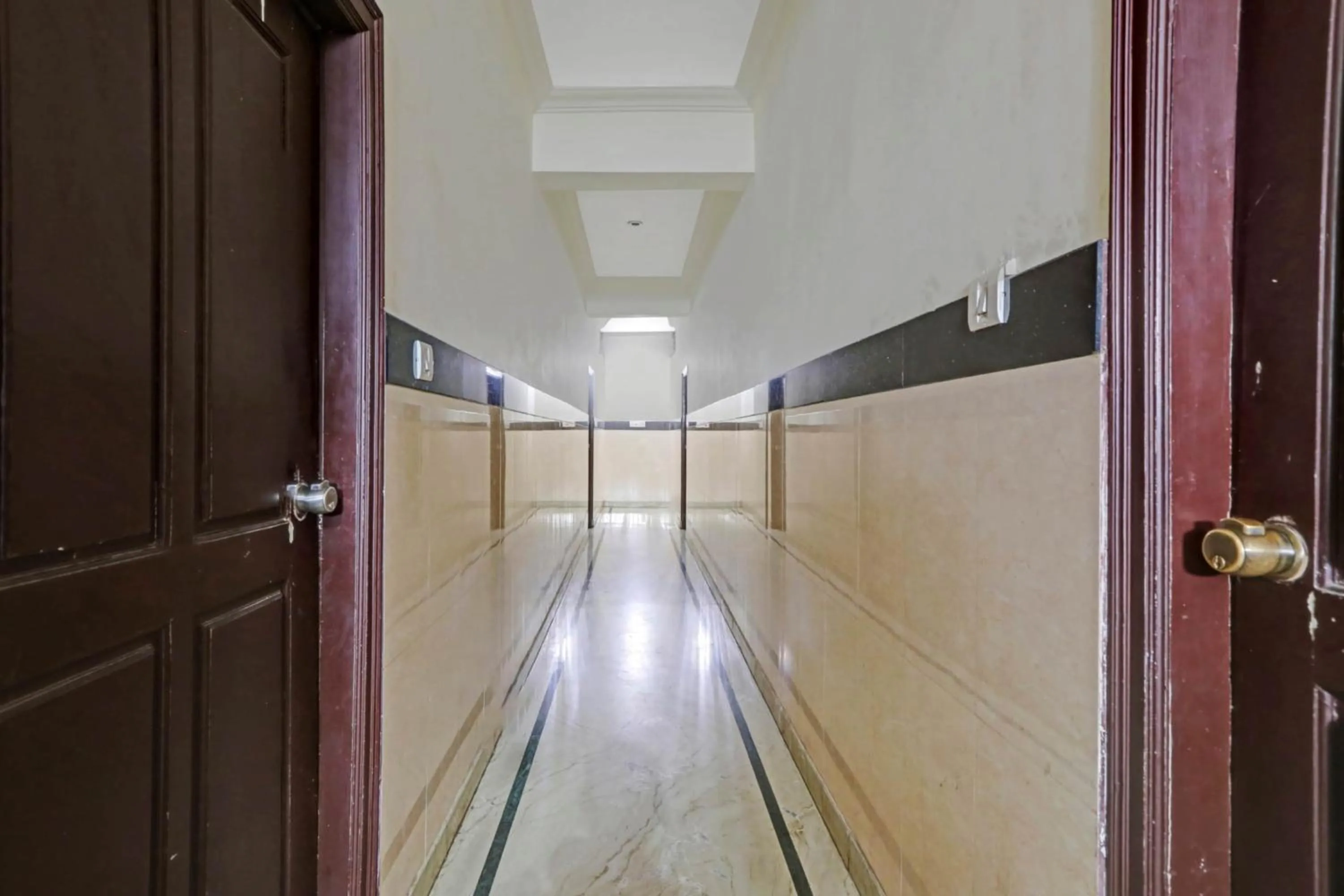 Bedroom in Hotel O Vishu Moni Residency