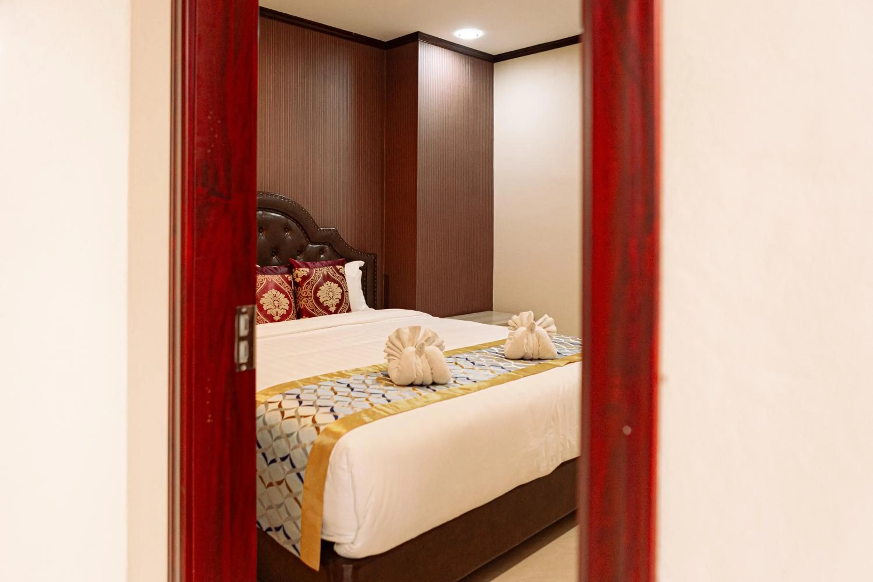 Bed in VANHSENG BOUTIQUE VIENTIANE HOTEL