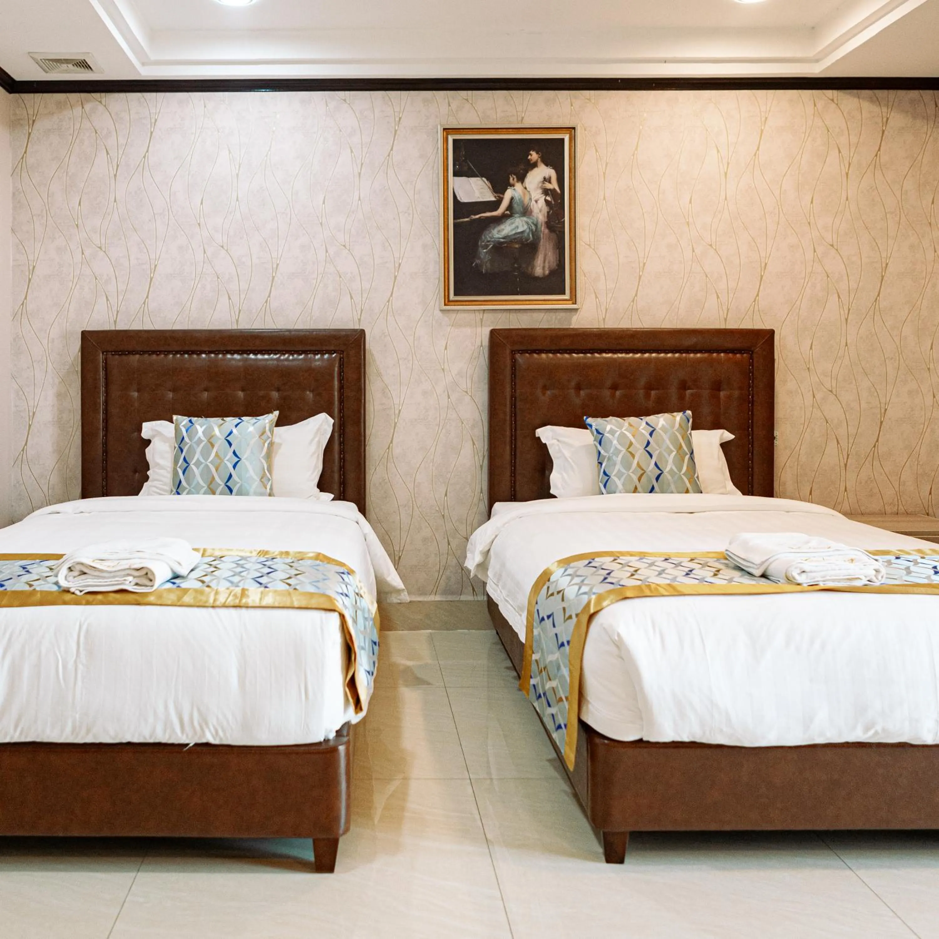 Bed in VANHSENG BOUTIQUE VIENTIANE HOTEL
