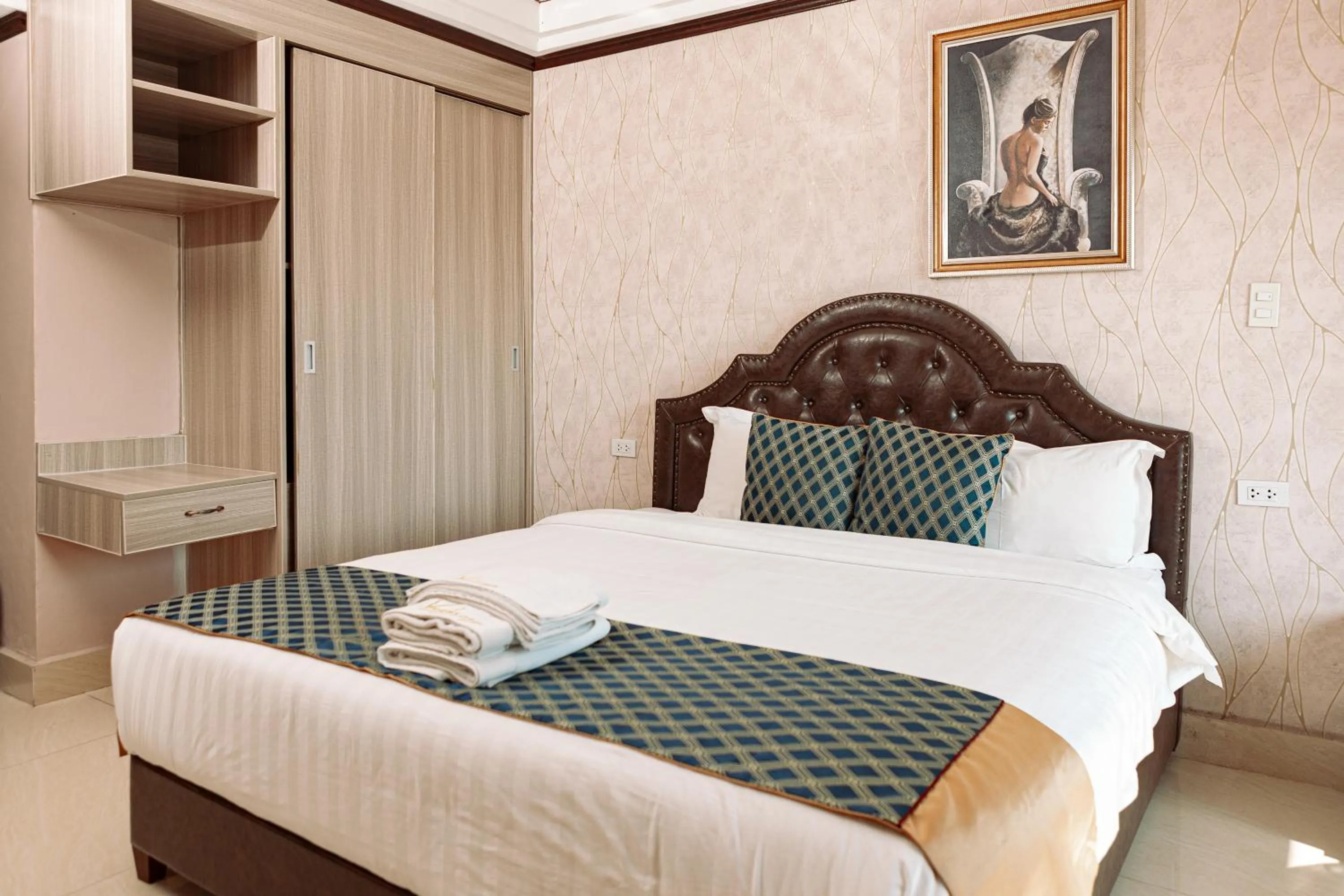 Bed in VANHSENG BOUTIQUE VIENTIANE HOTEL
