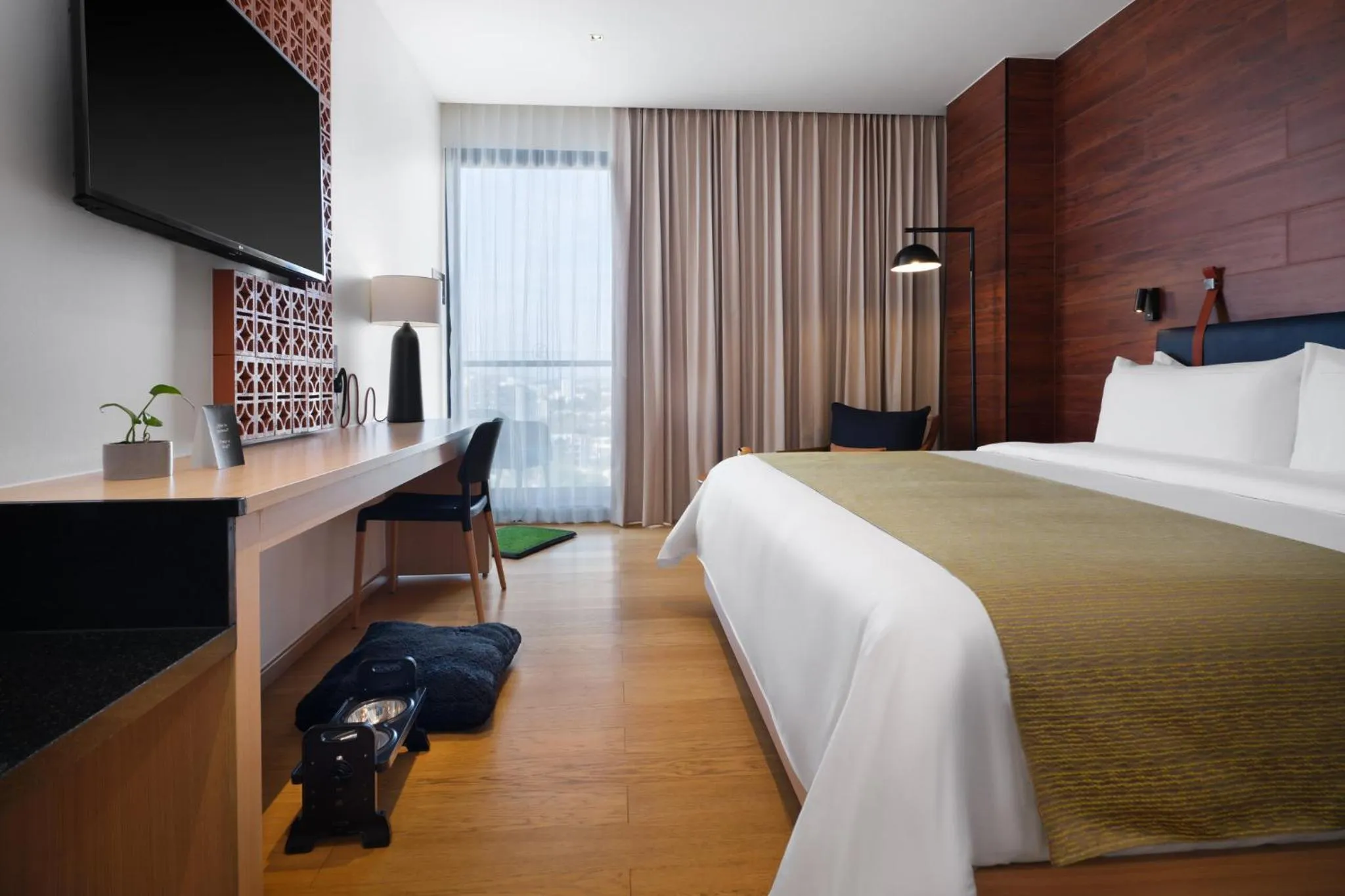 Photo of the whole room, Bed in voco Guadalajara Neruda by IHG