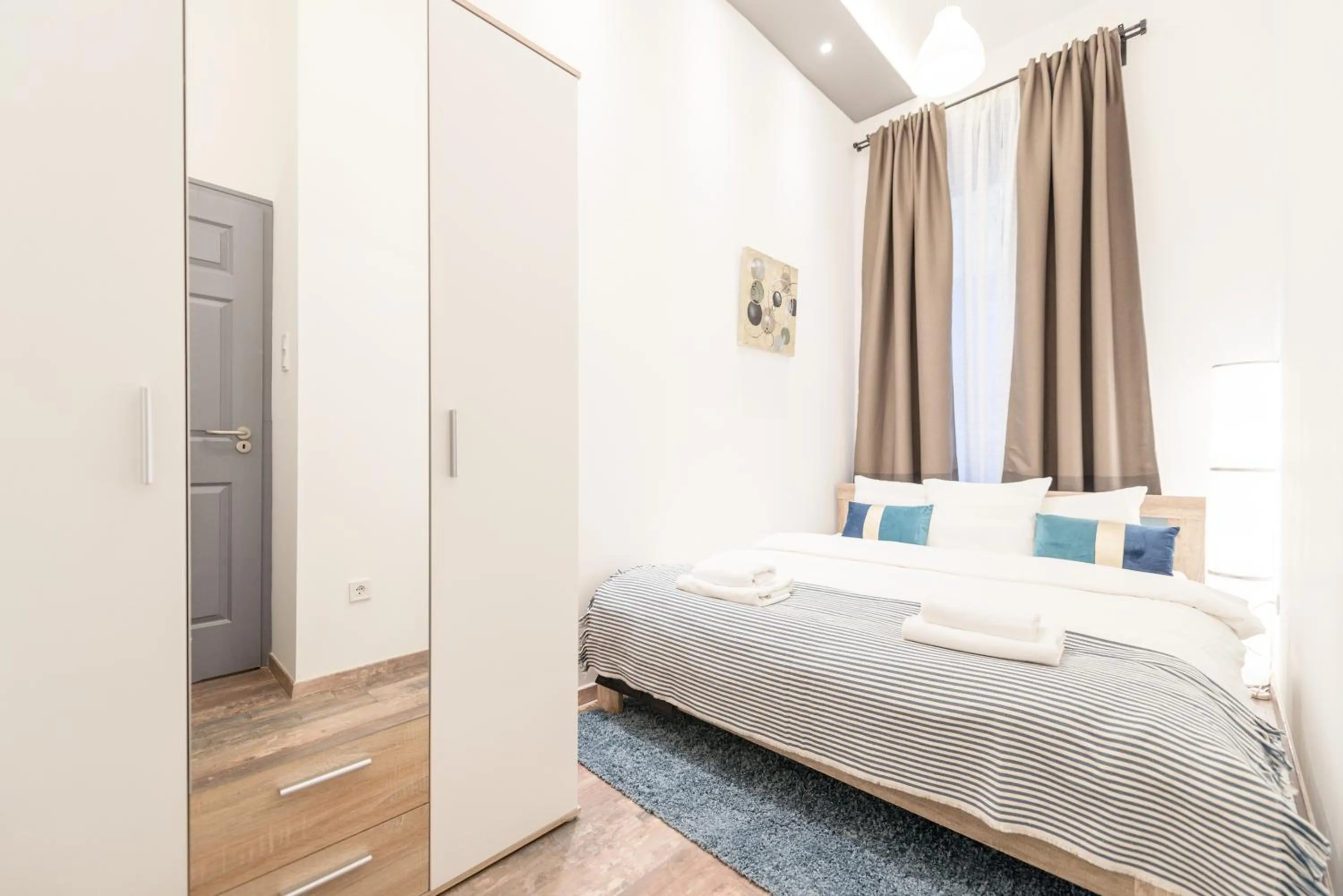 Bed in Venus Apartments - Almassy Park