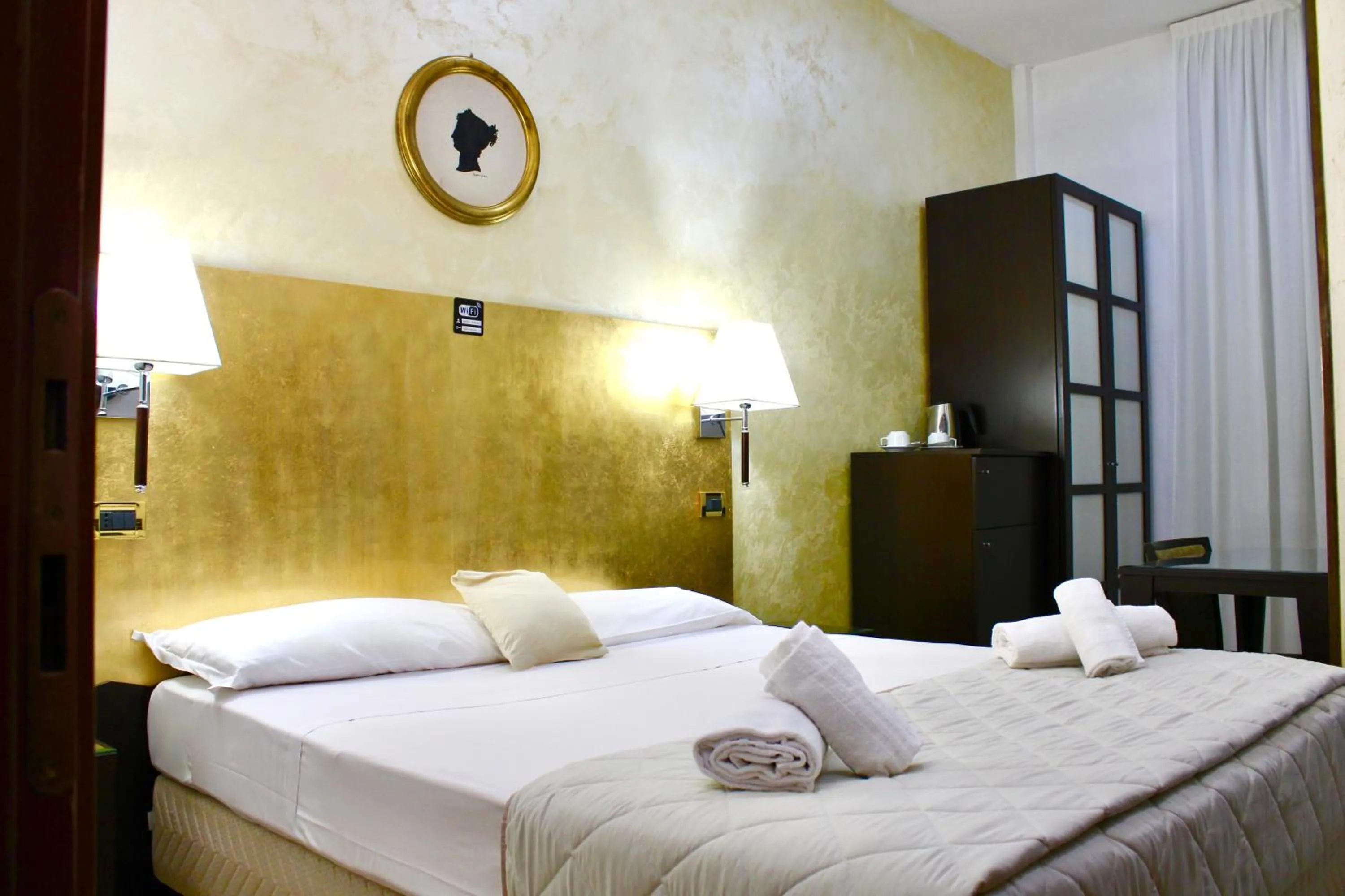 Photo of the whole room, Bed in Hotel Fiorella Milano
