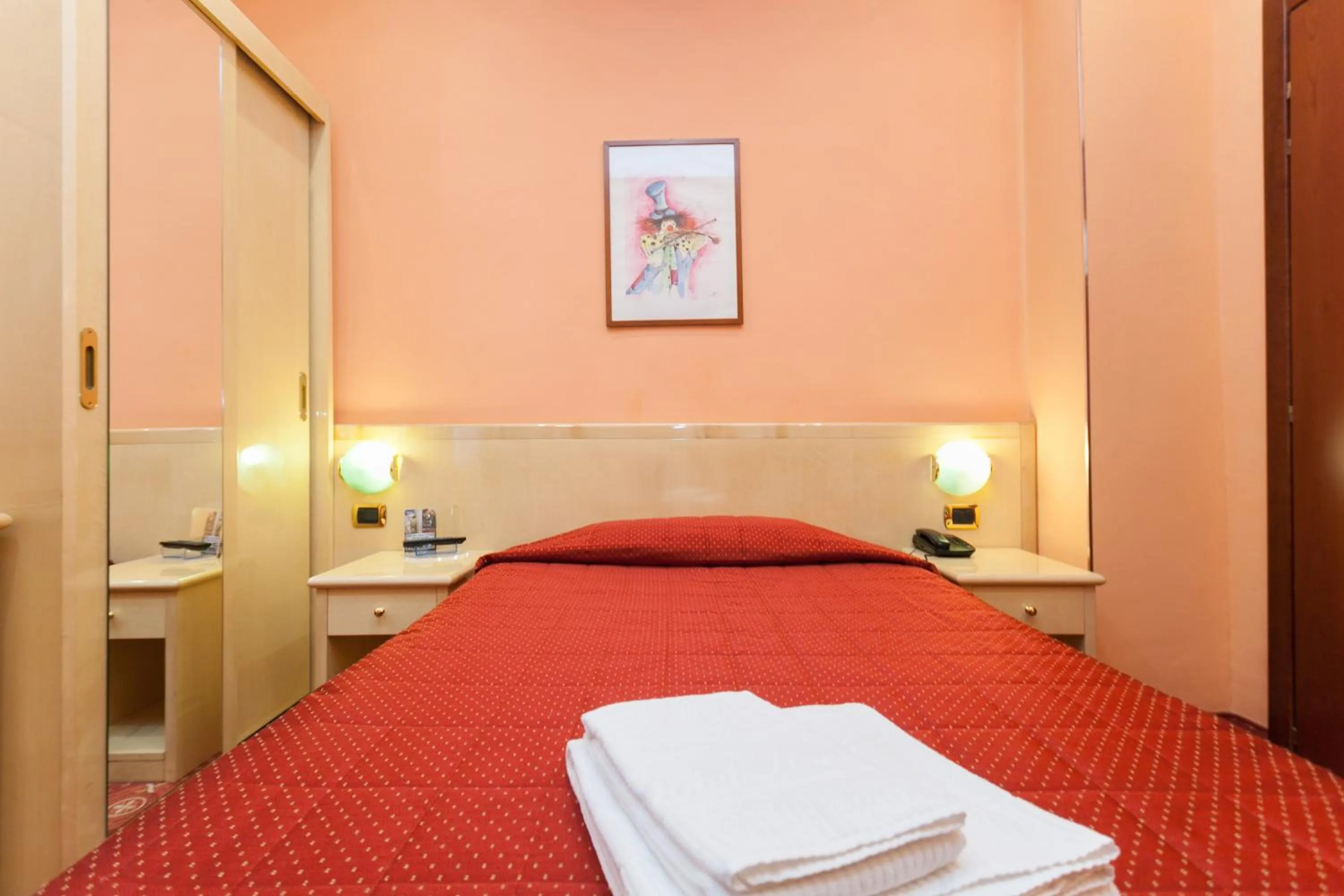 Bedroom, Bed in Hotel Fiorella Milano