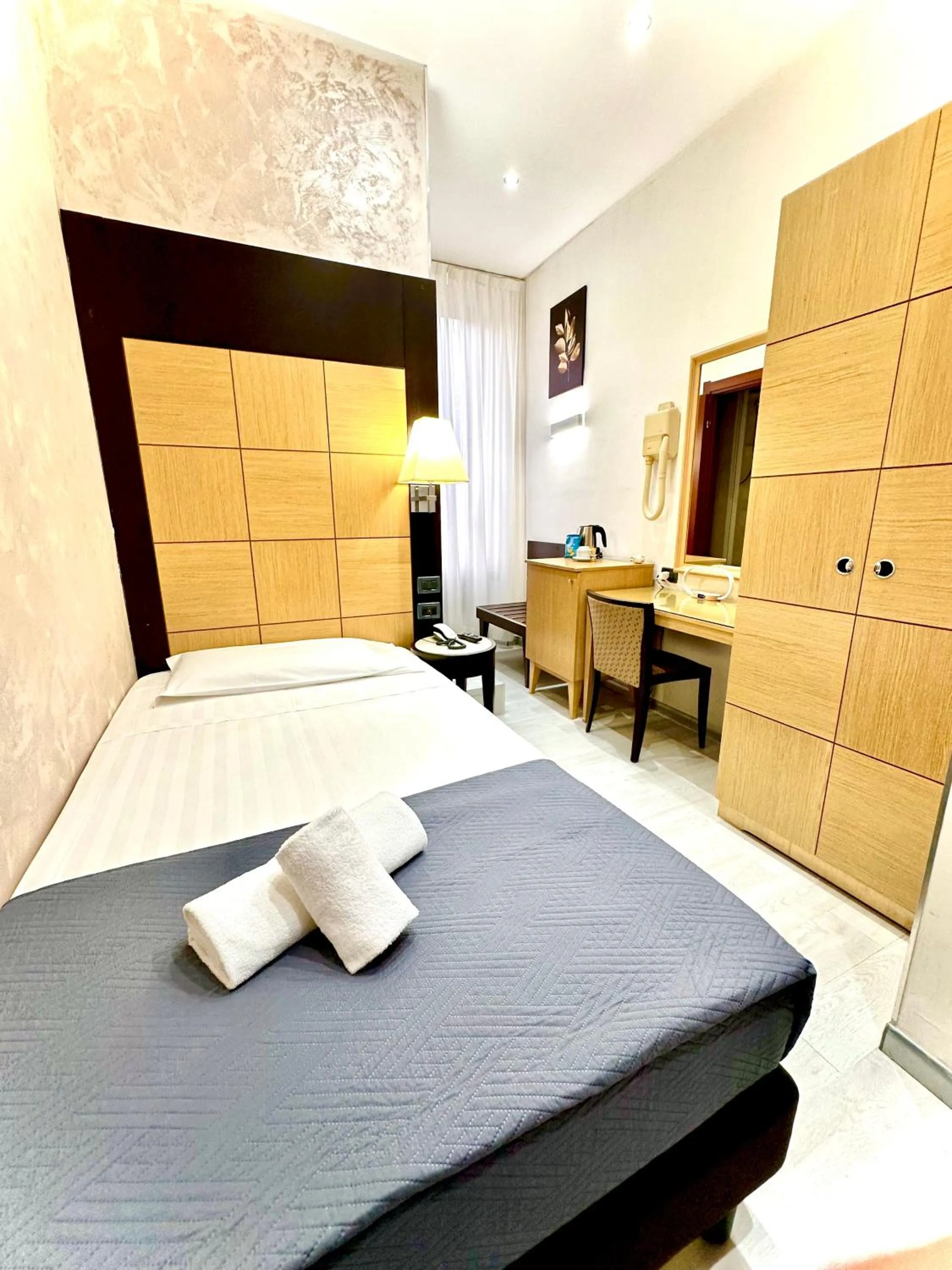 Bedroom, Bed in Hotel Fiorella Milano