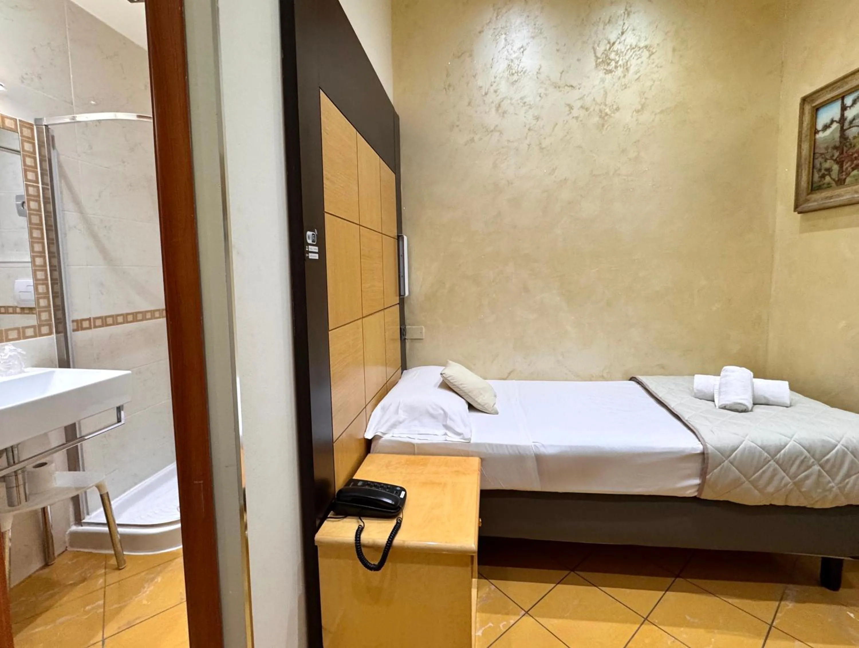 Photo of the whole room, Bed in Hotel Fiorella Milano