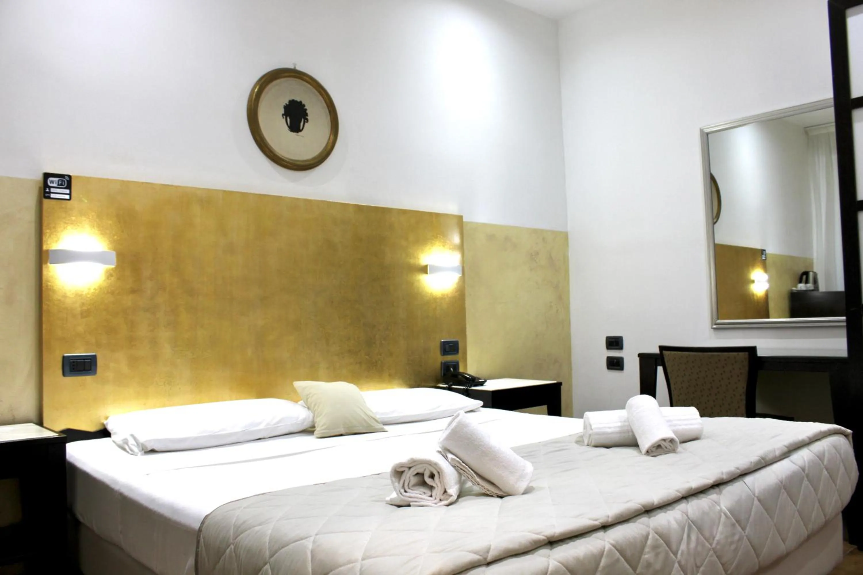 Photo of the whole room, Bed in Hotel Fiorella Milano