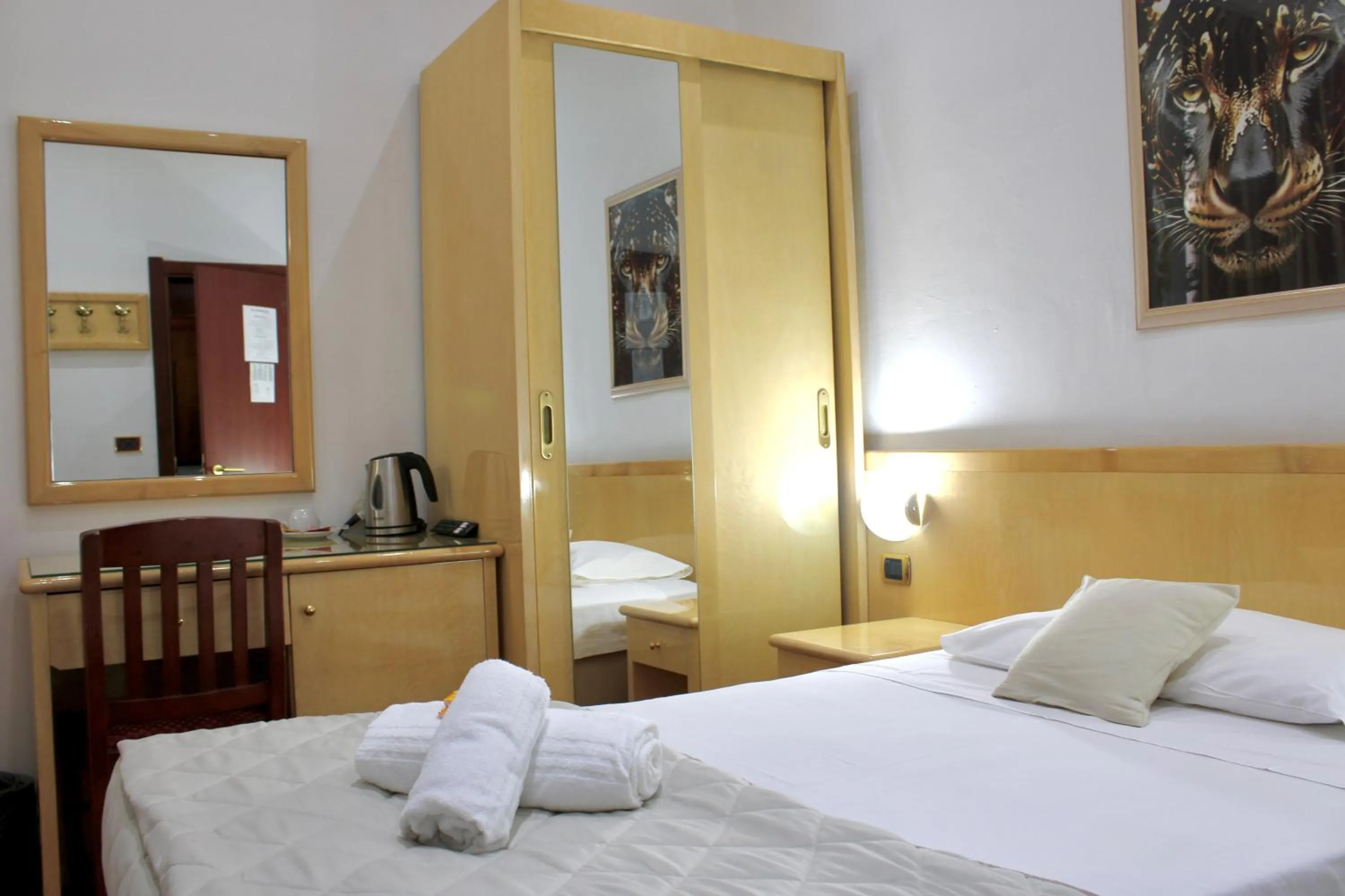 Photo of the whole room, Bed in Hotel Fiorella Milano