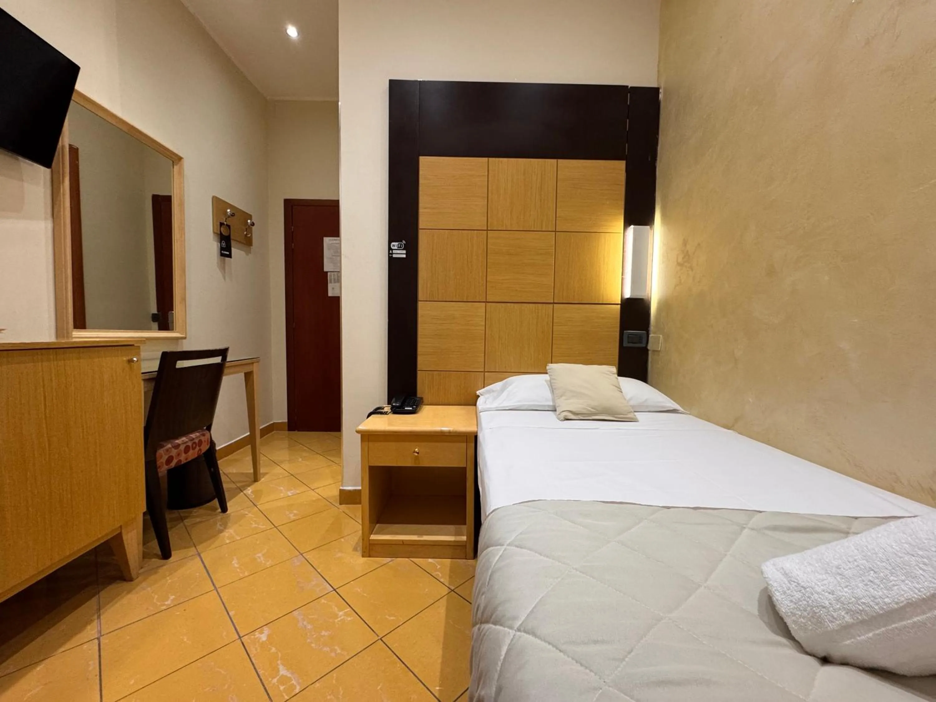 Bedroom, Bed in Hotel Fiorella Milano