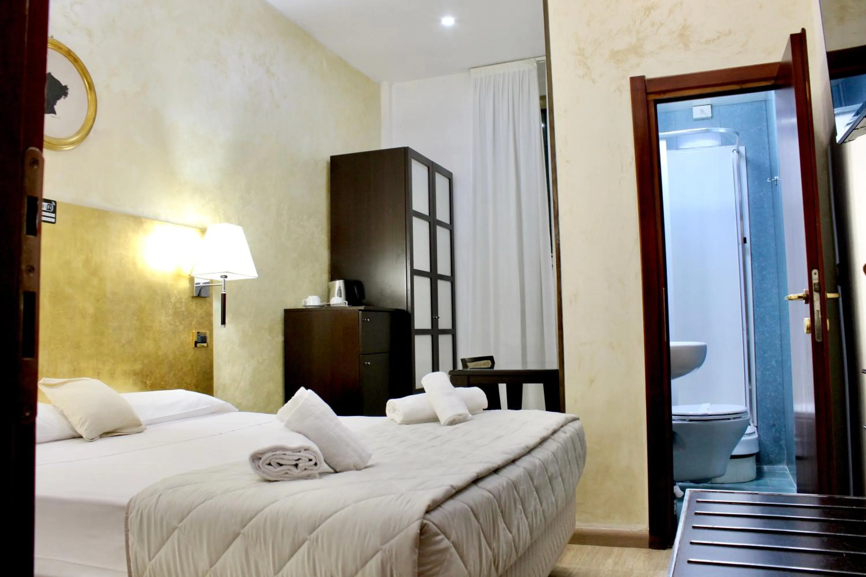 Photo of the whole room, Bed in Hotel Fiorella Milano