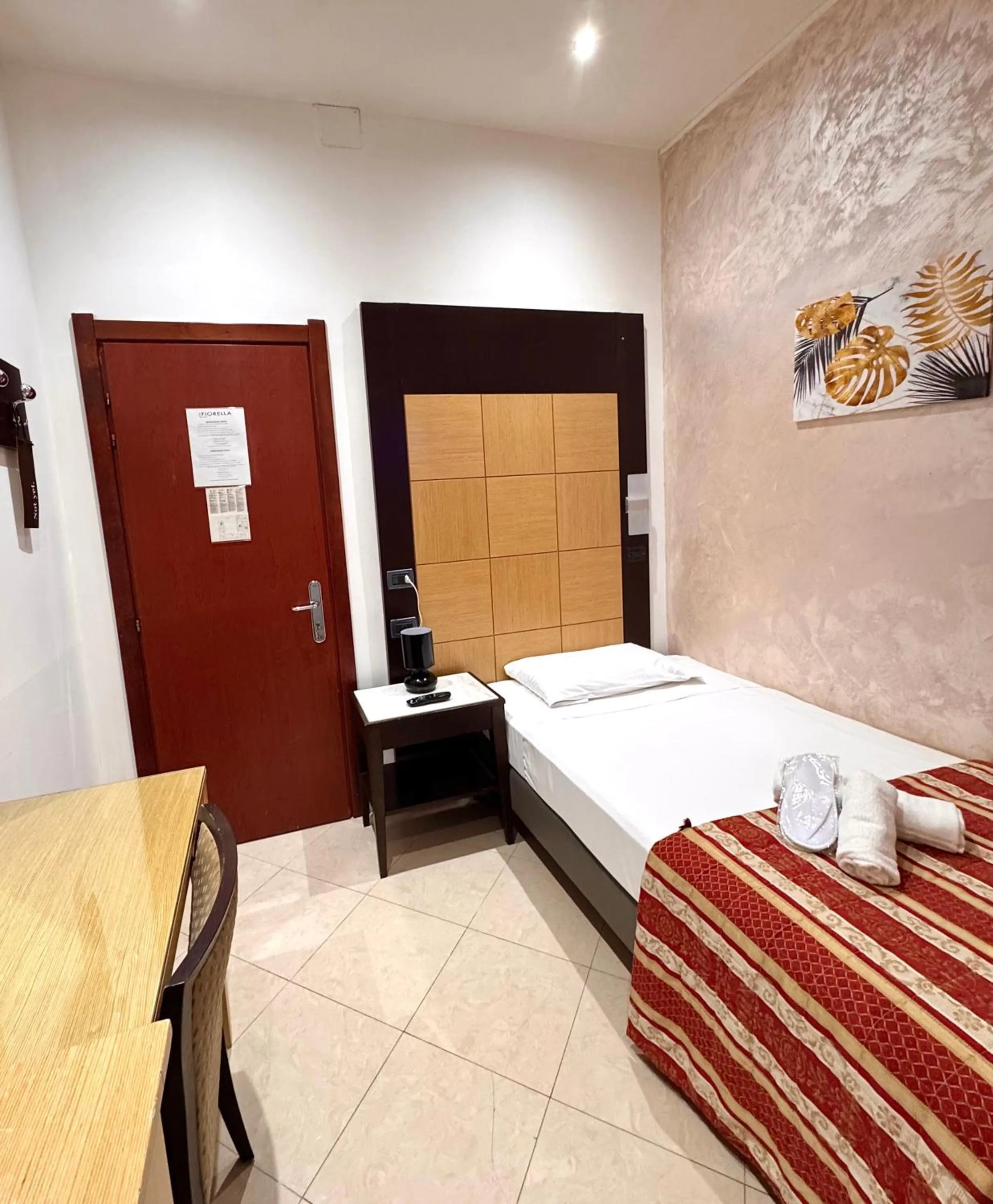 Bedroom, Bed in Hotel Fiorella Milano