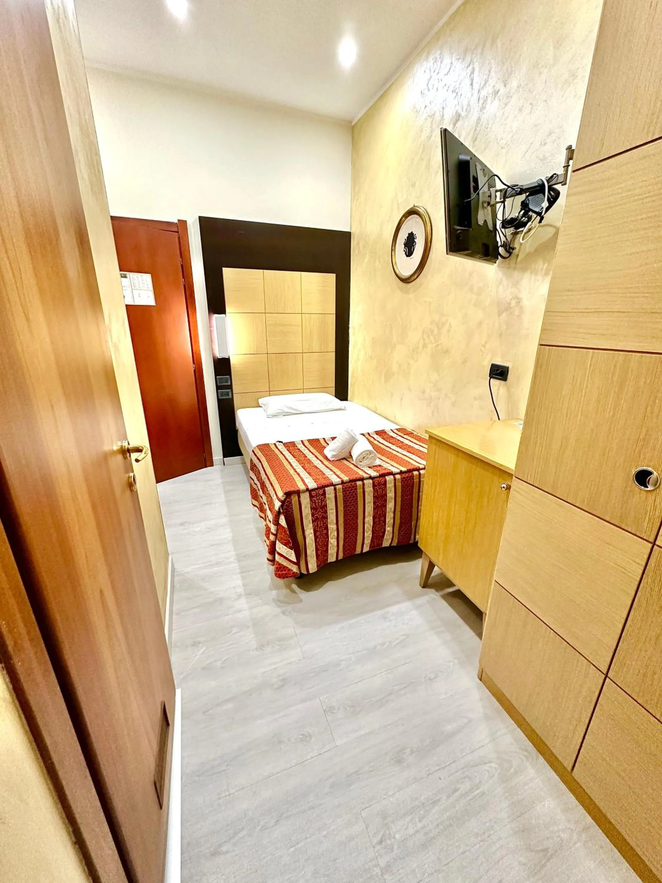 Photo of the whole room, Bed in Hotel Fiorella Milano