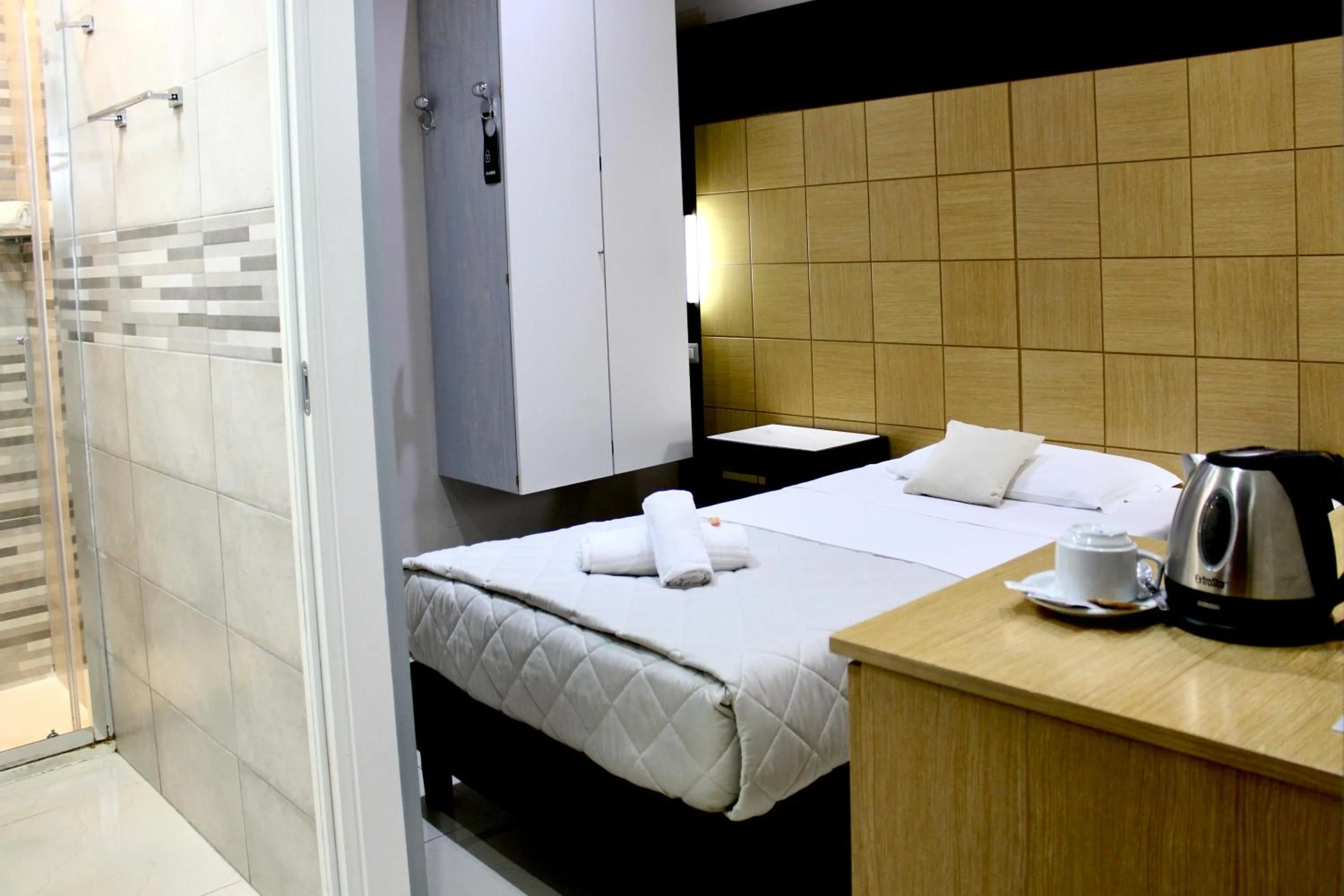 Photo of the whole room, Bed in Hotel Fiorella Milano