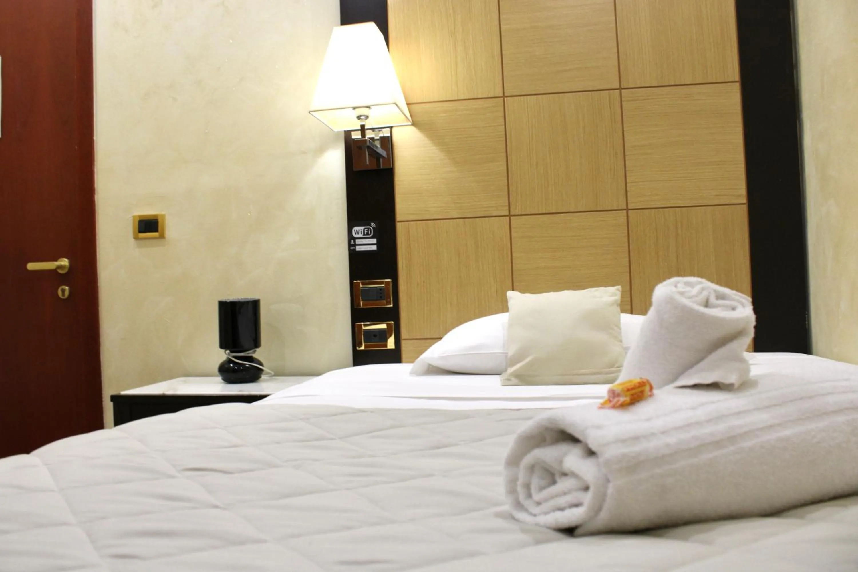 Photo of the whole room, Bed in Hotel Fiorella Milano