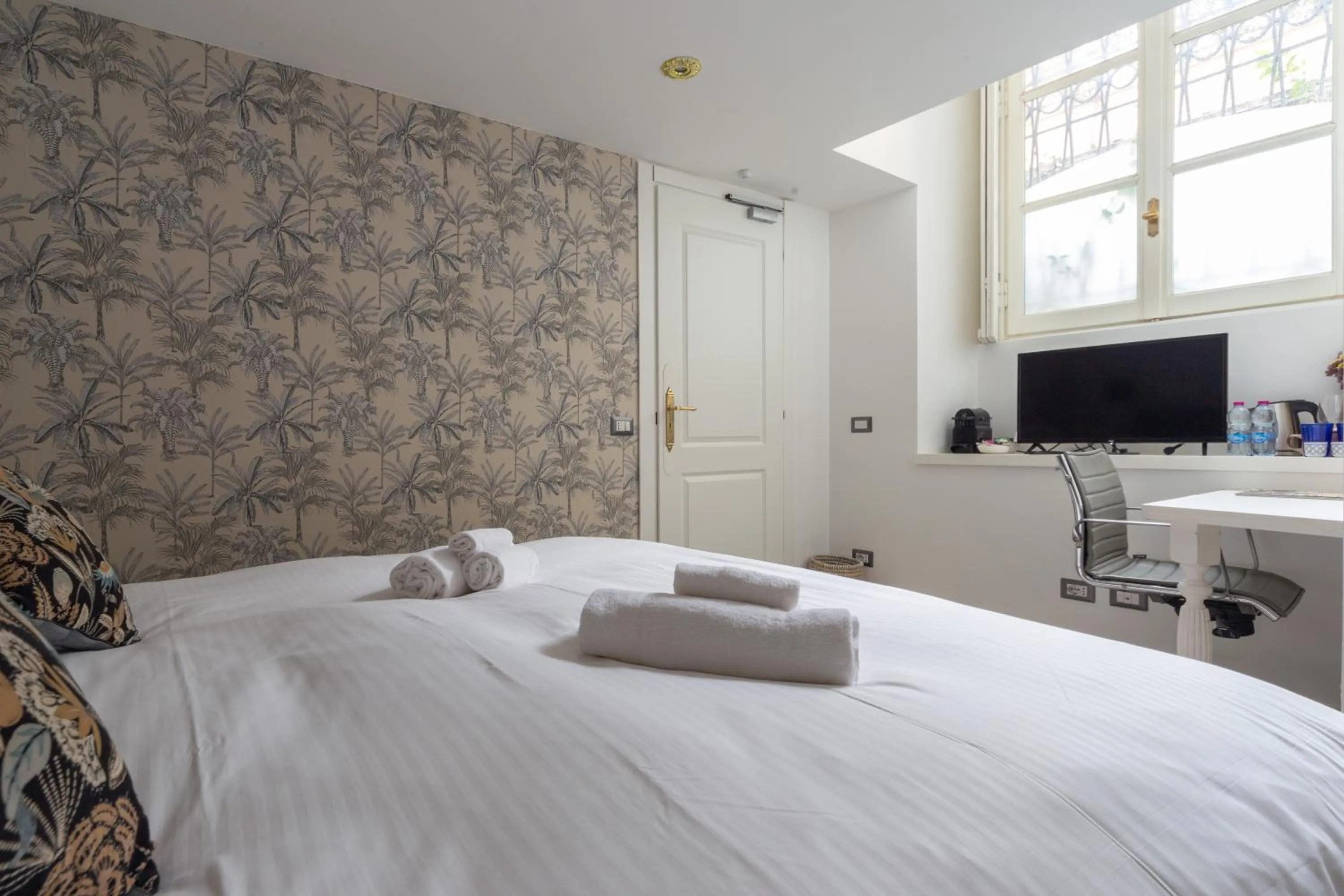 Bed in Duomo Smart Suites