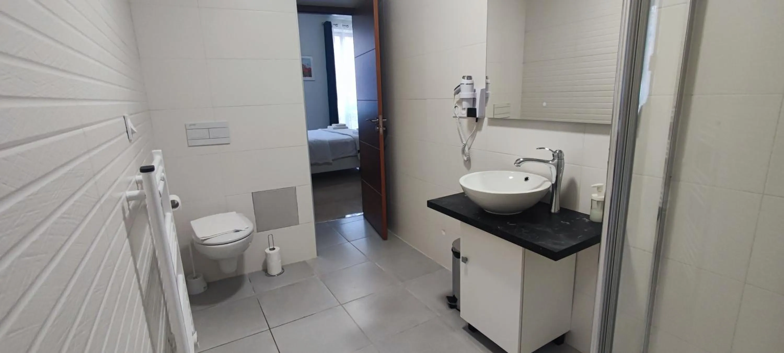 Bathroom in SQUARE HOTEL