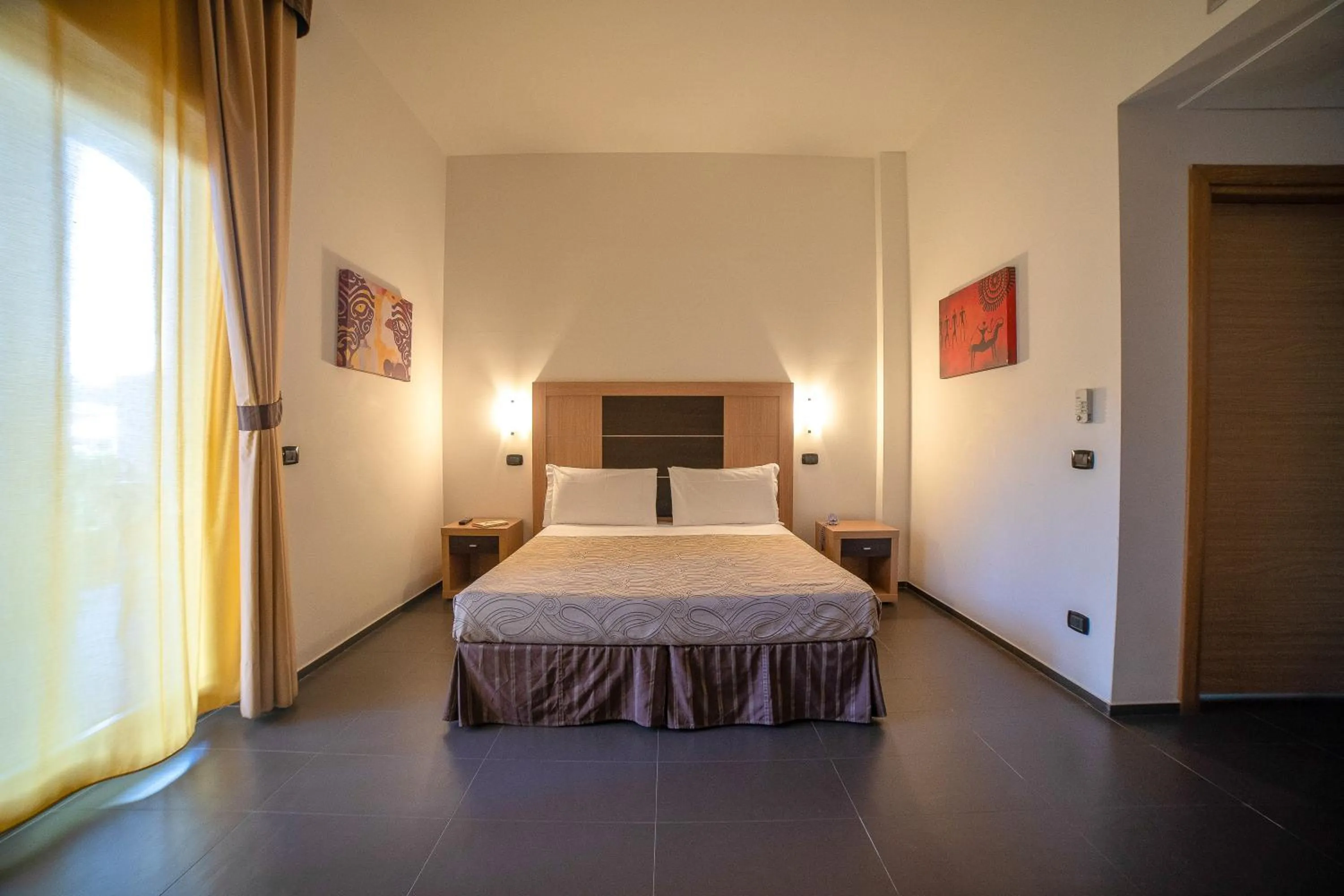 Bedroom, Bed in VOI Baia di Tindari Resort