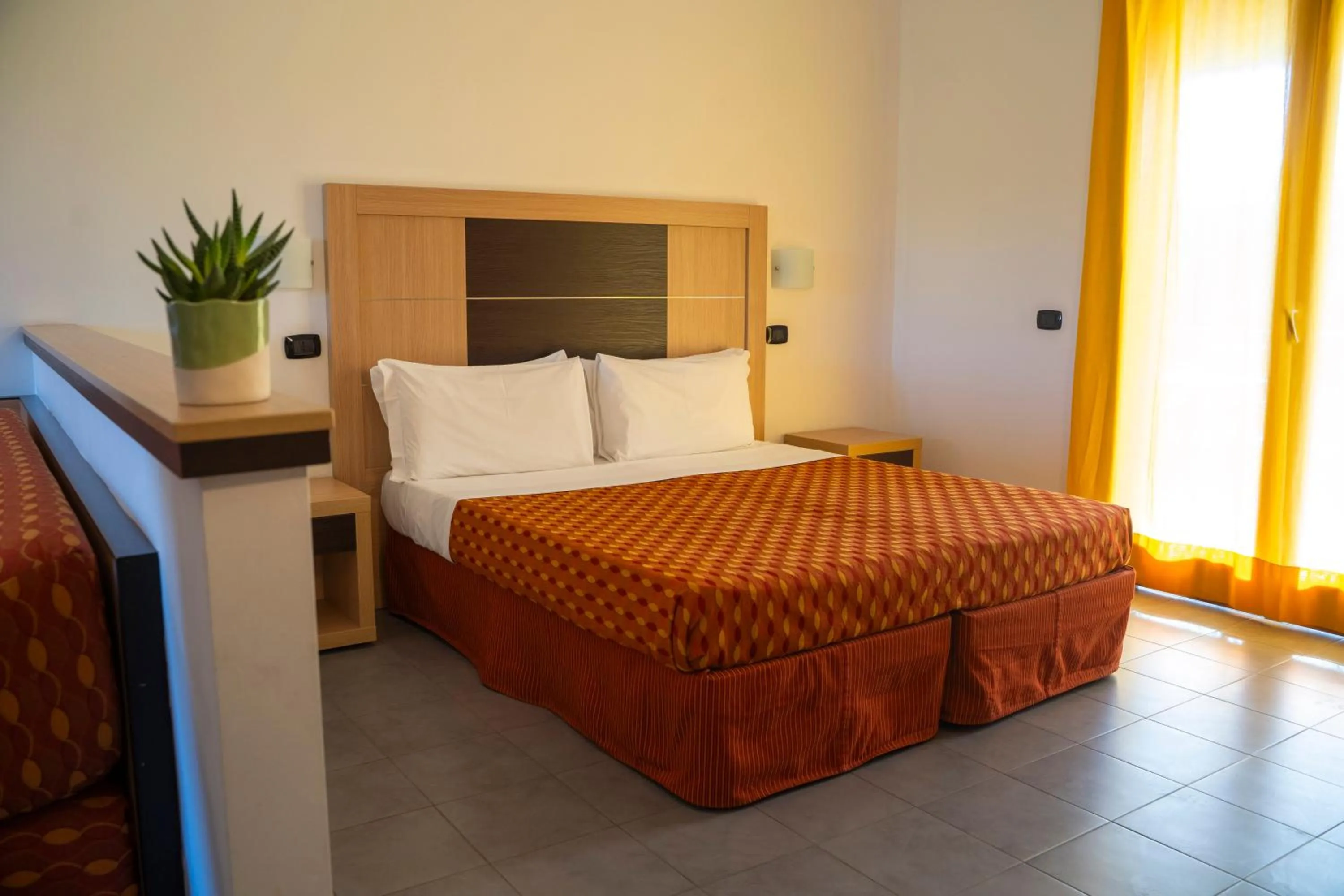 Bedroom, Bed in VOI Baia di Tindari Resort