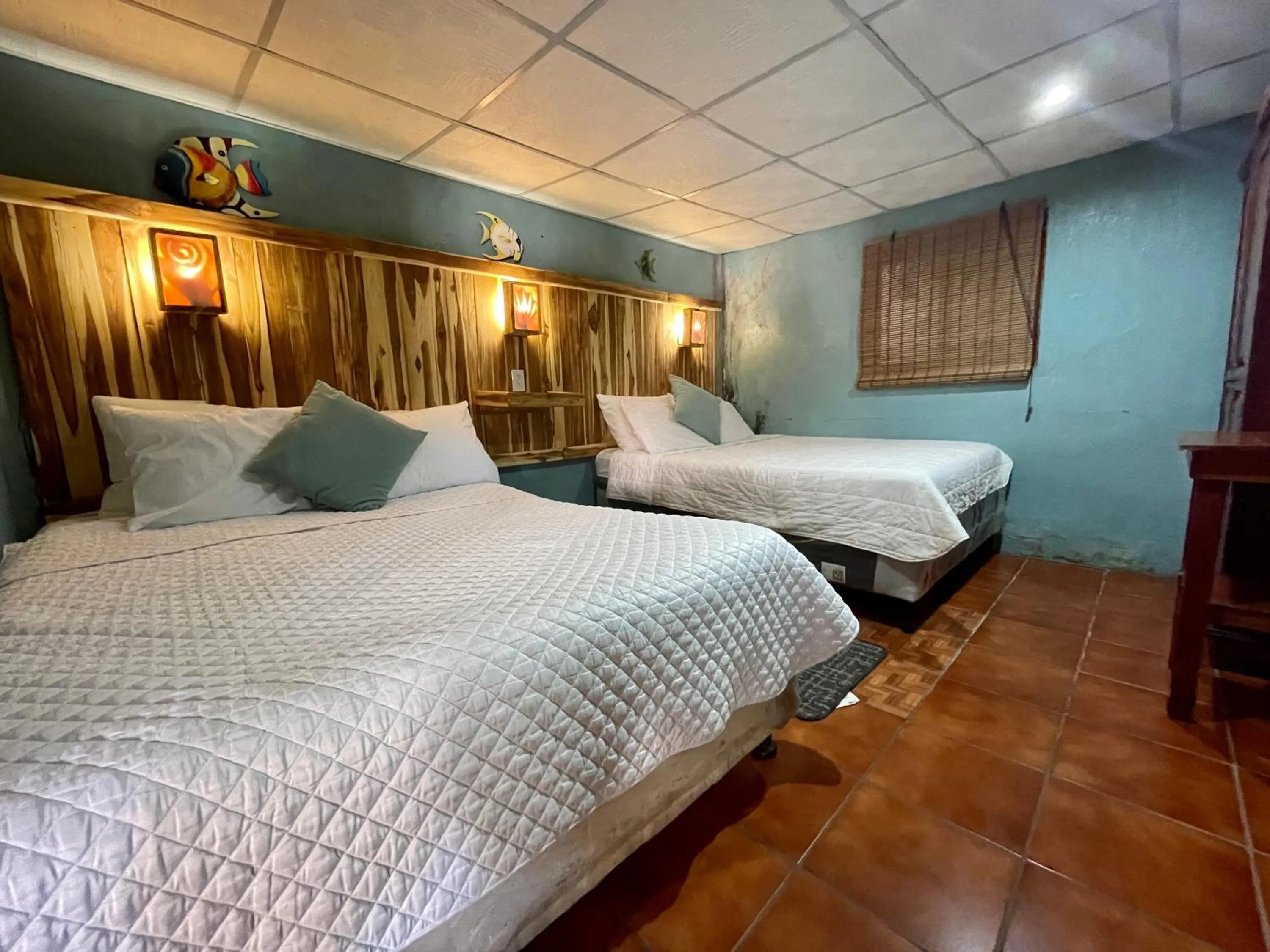 air conditioner, Bed in Johnnys Place Hotel