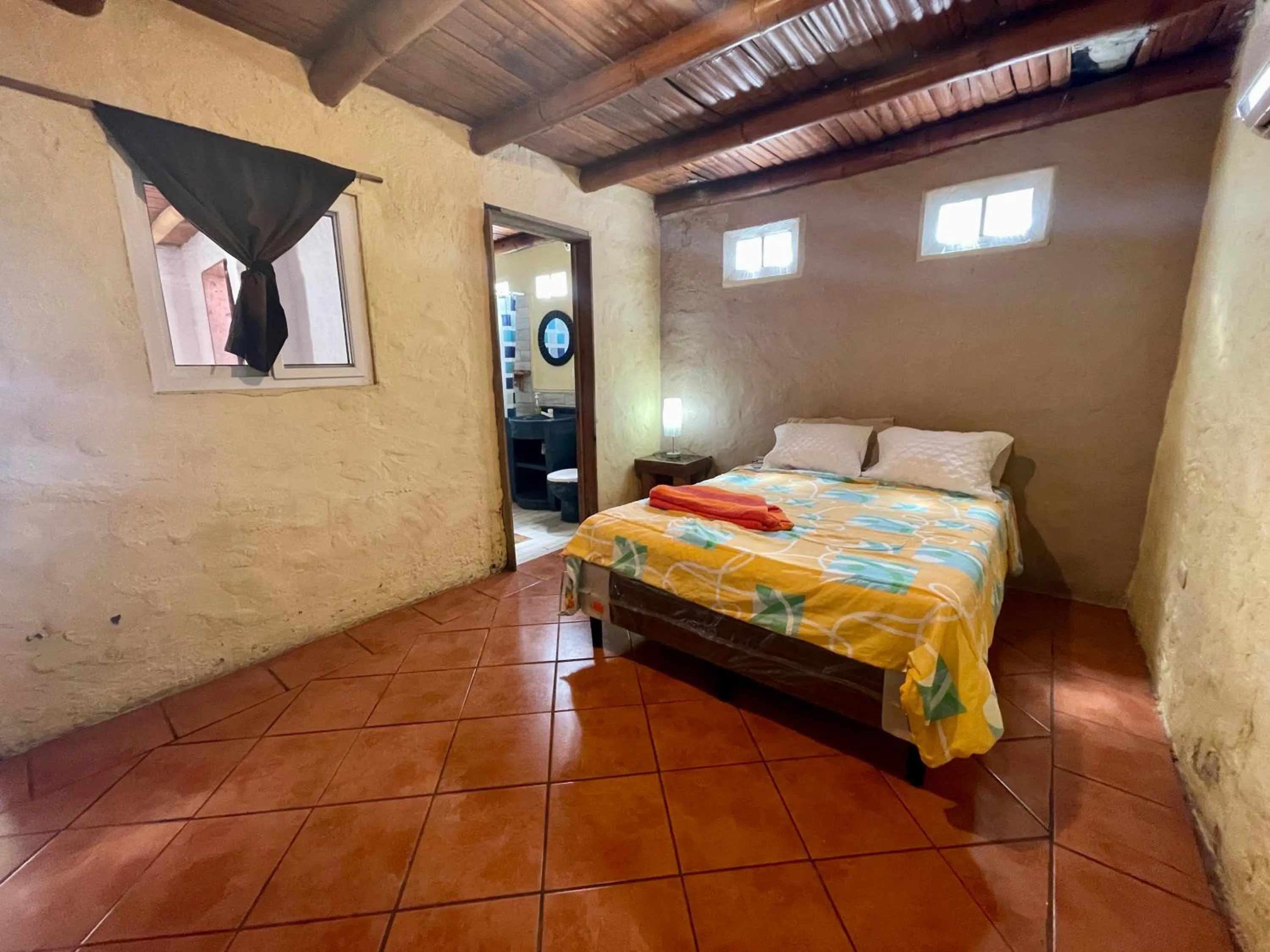 air conditioner, Bed in Johnnys Place Hotel