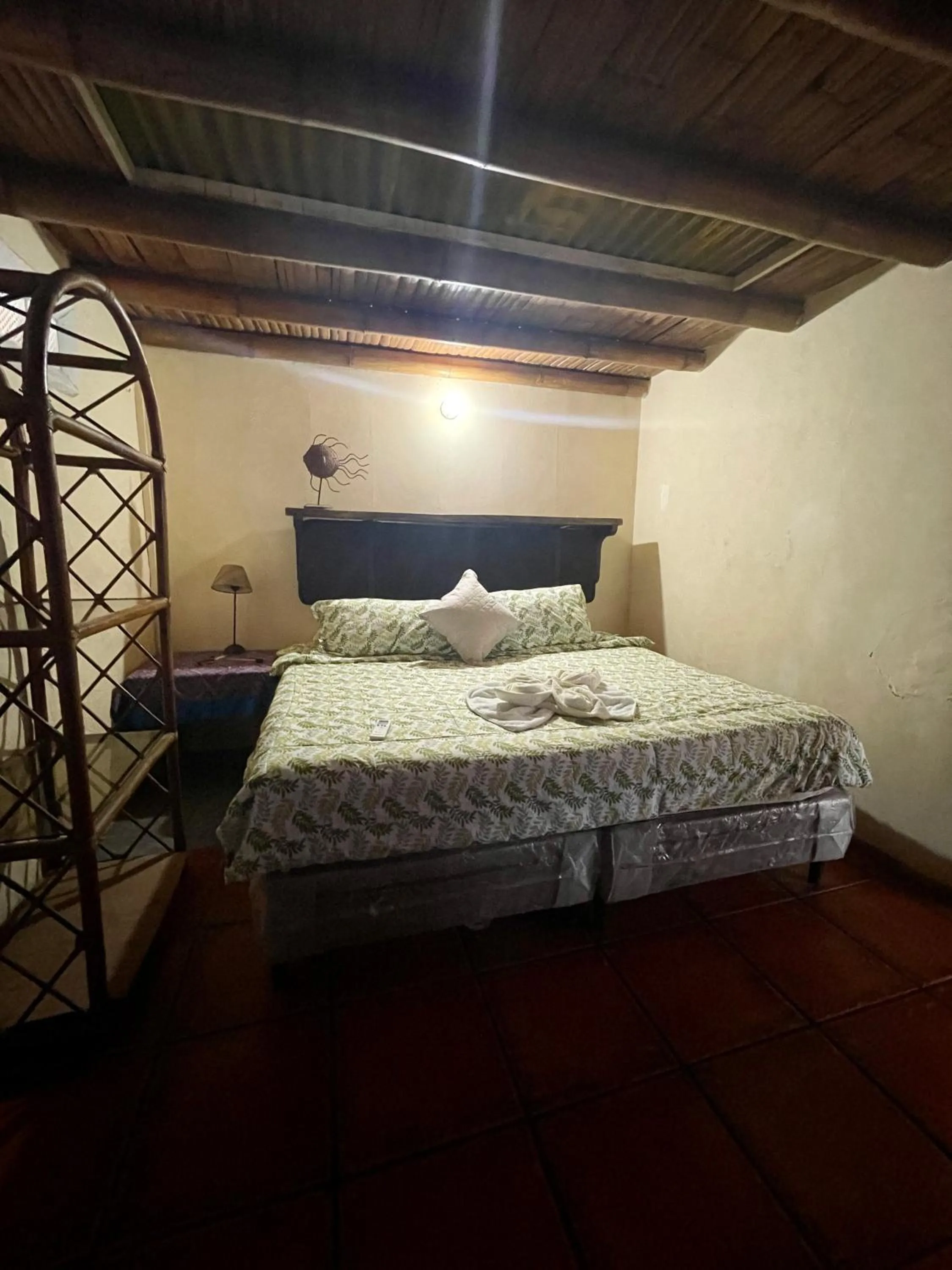 air conditioner, Bed in Johnnys Place Hotel