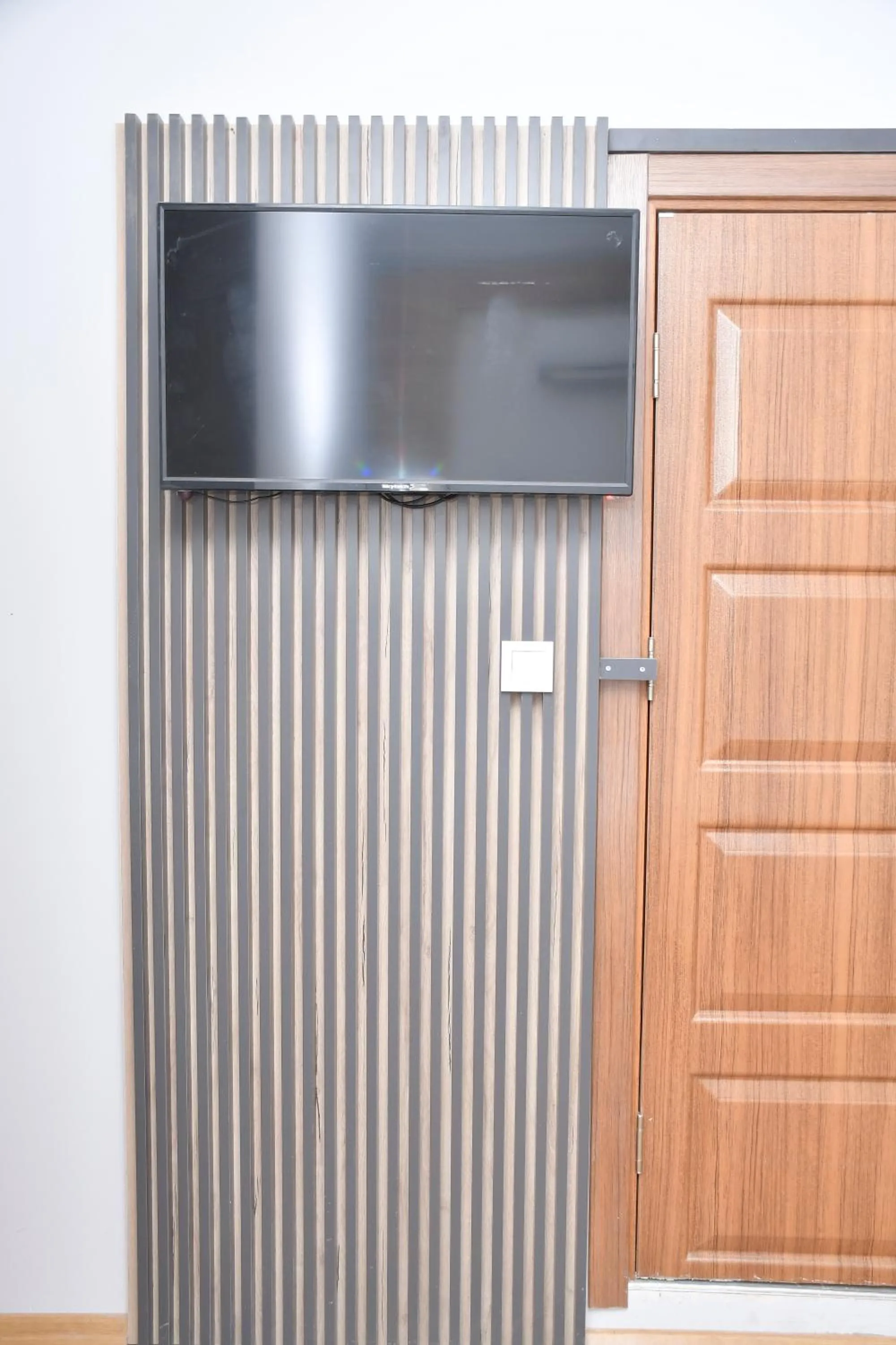 Communal lounge/ TV room in Hotel Arinna