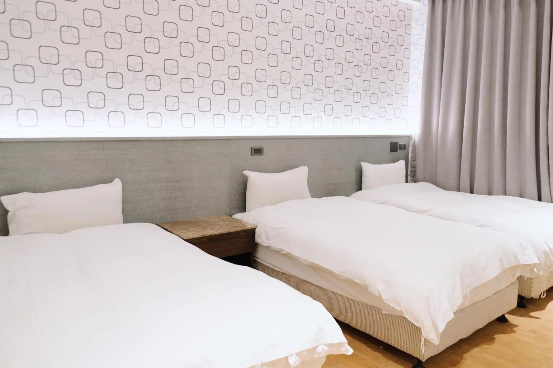 Bed in Hoping Mori Hotel