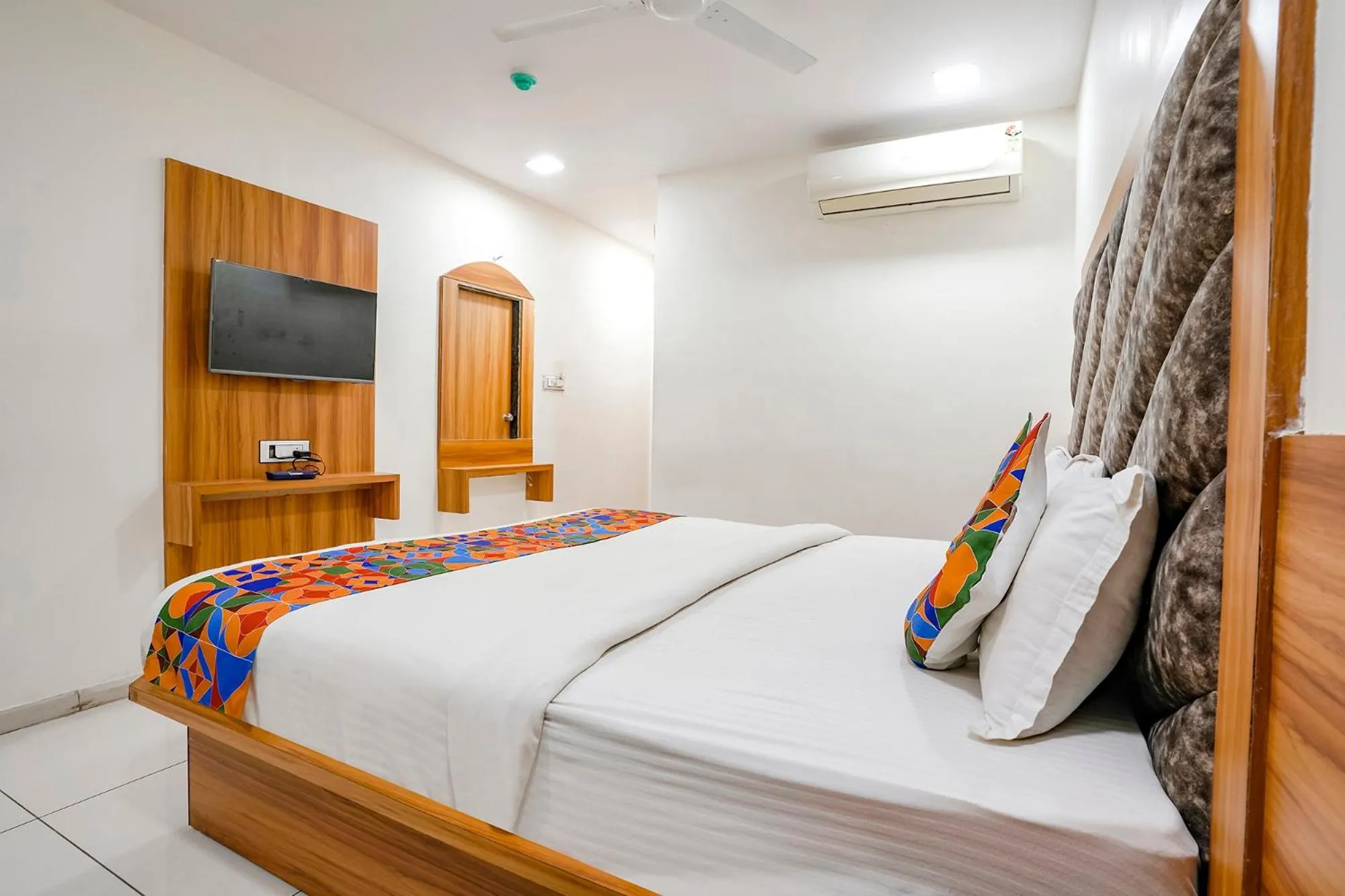 Bed in FabHotel Silver Inn