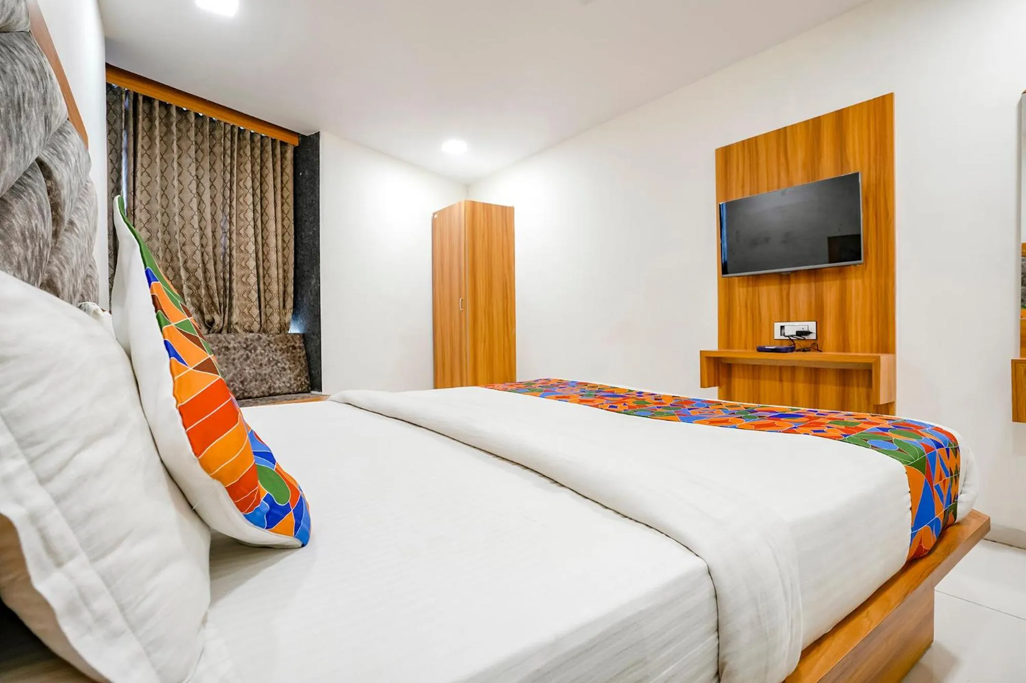 Bed in FabHotel Silver Inn