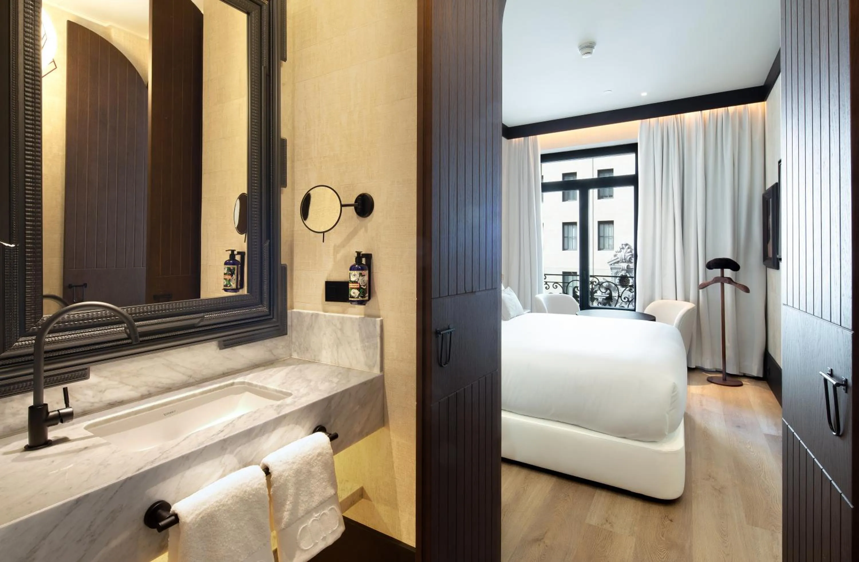 Toilet, Bed in Hotel Montera Madrid, Curio Collection By Hilton