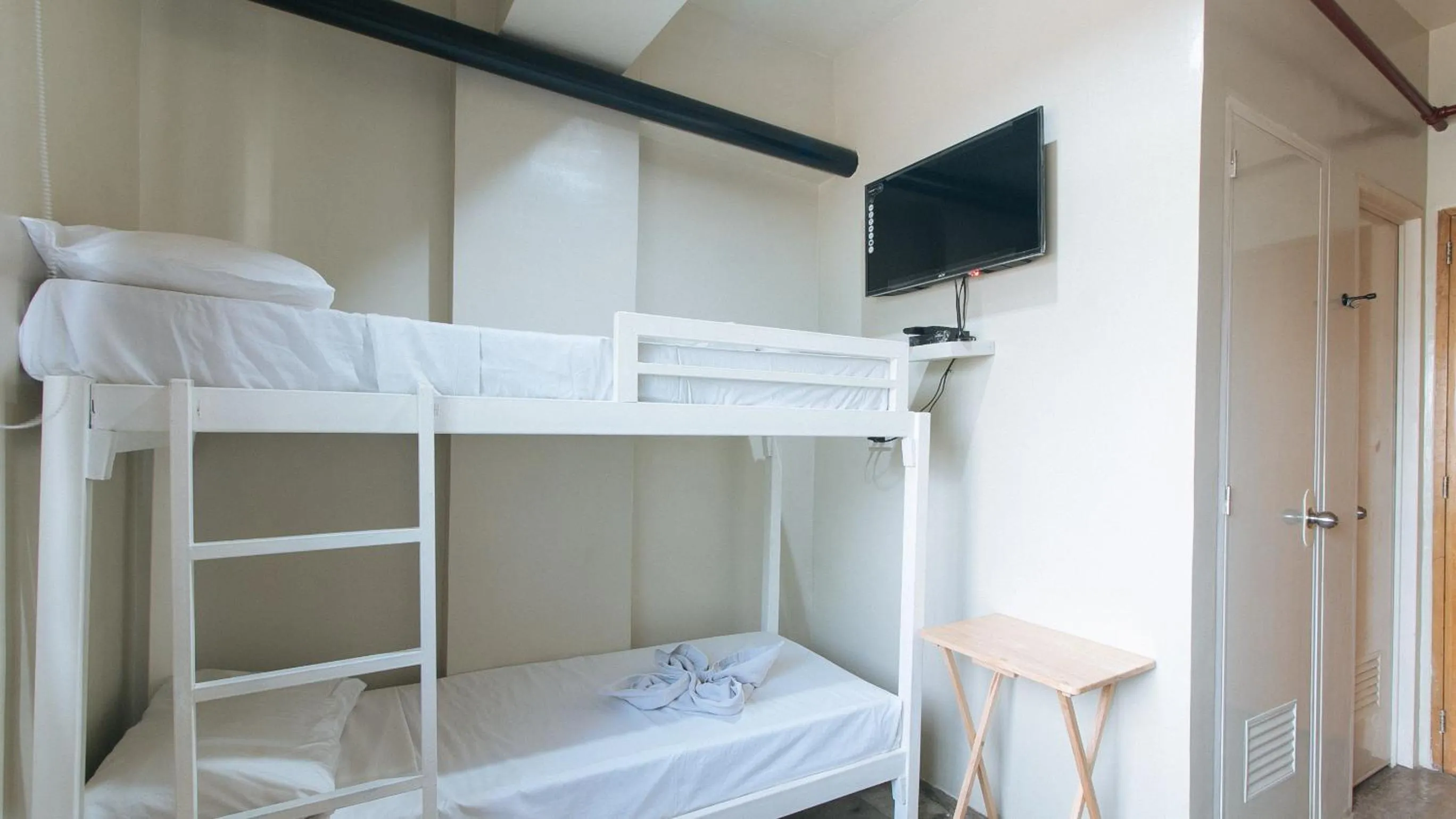 TV and multimedia in Filmore Suites Makati by RedDoorz