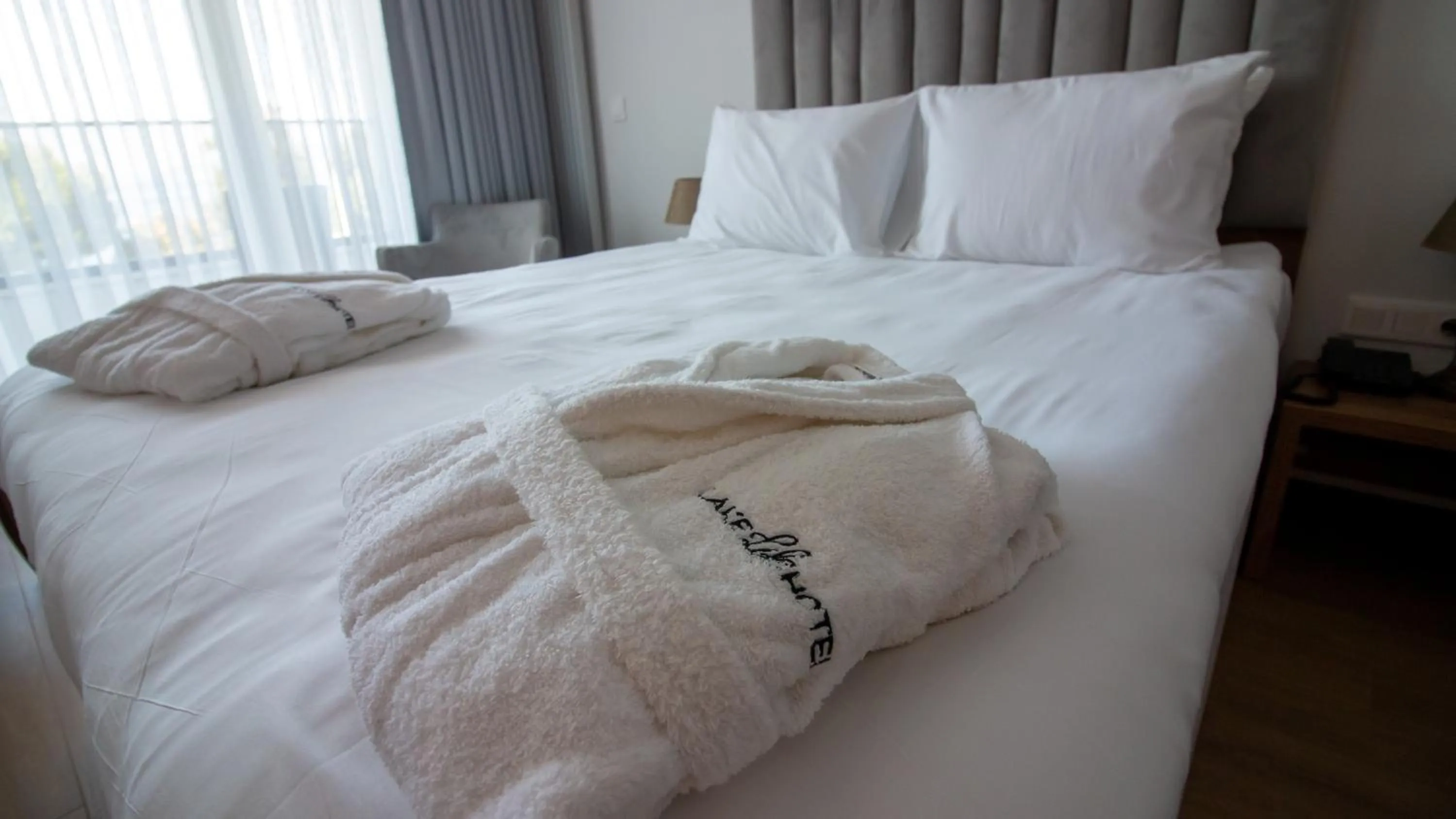 Bed in Lake Life Hotel