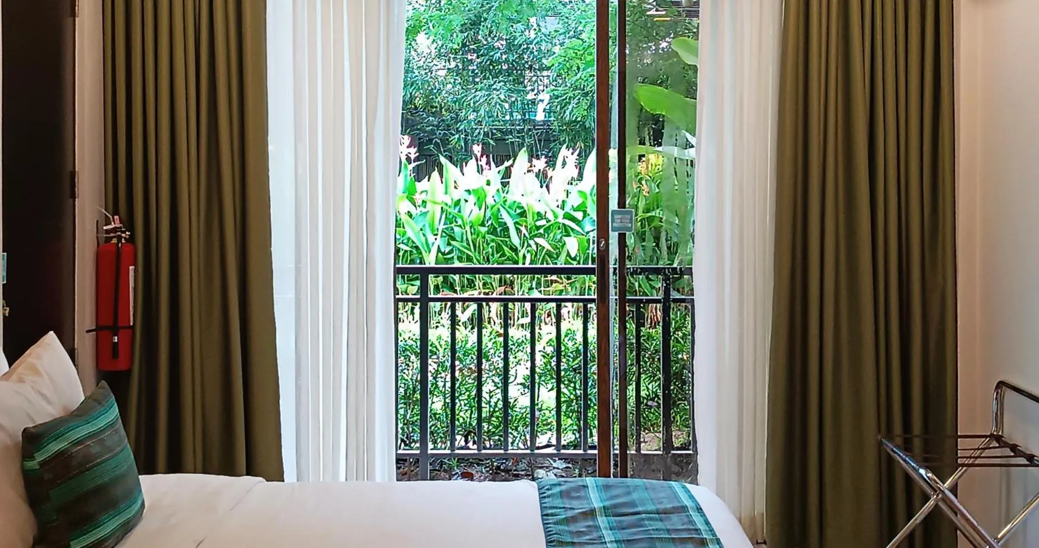 Garden view, Bed in TAG Resort